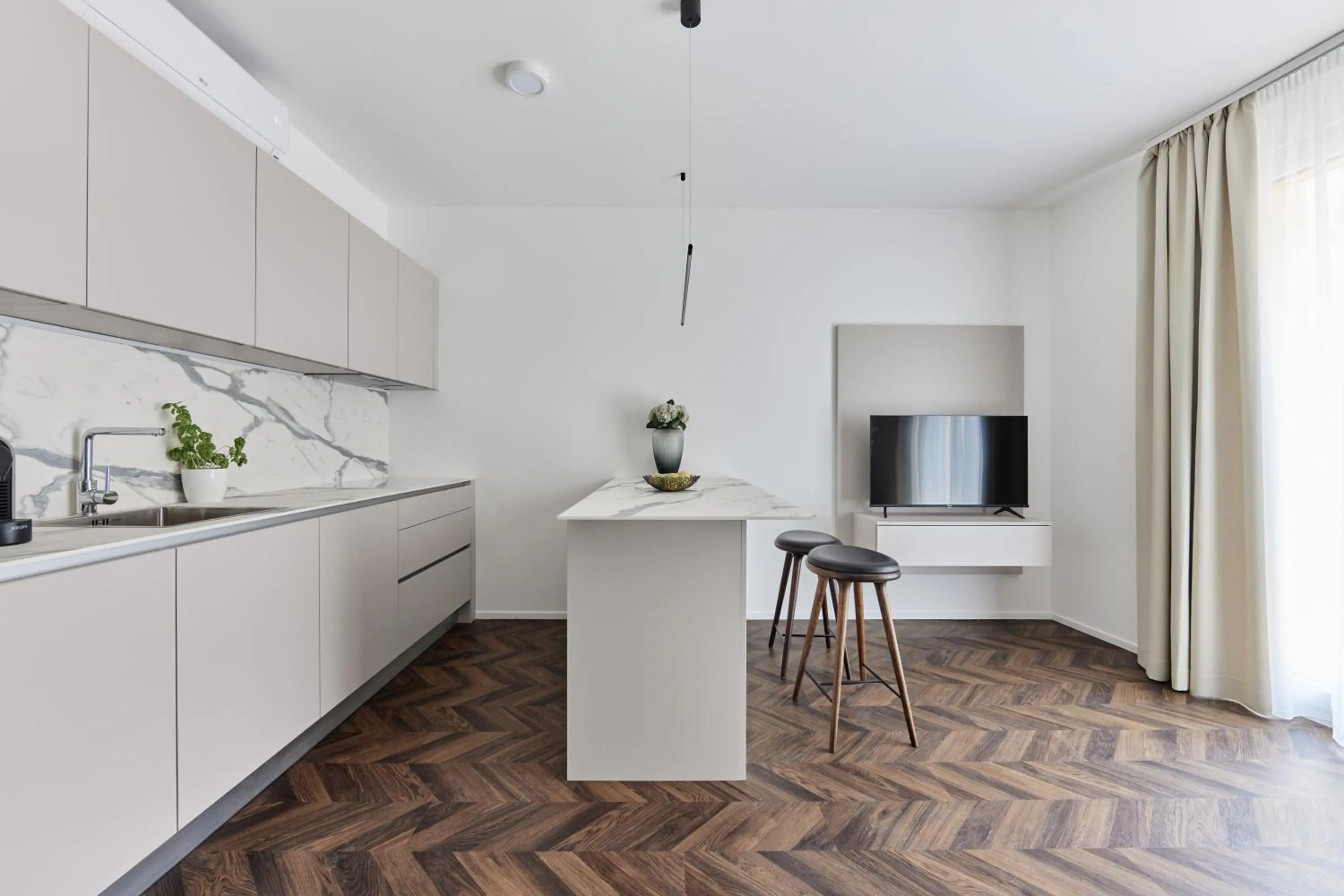 Kitchen or kitchenette in The Amberlyn Suite Hotel