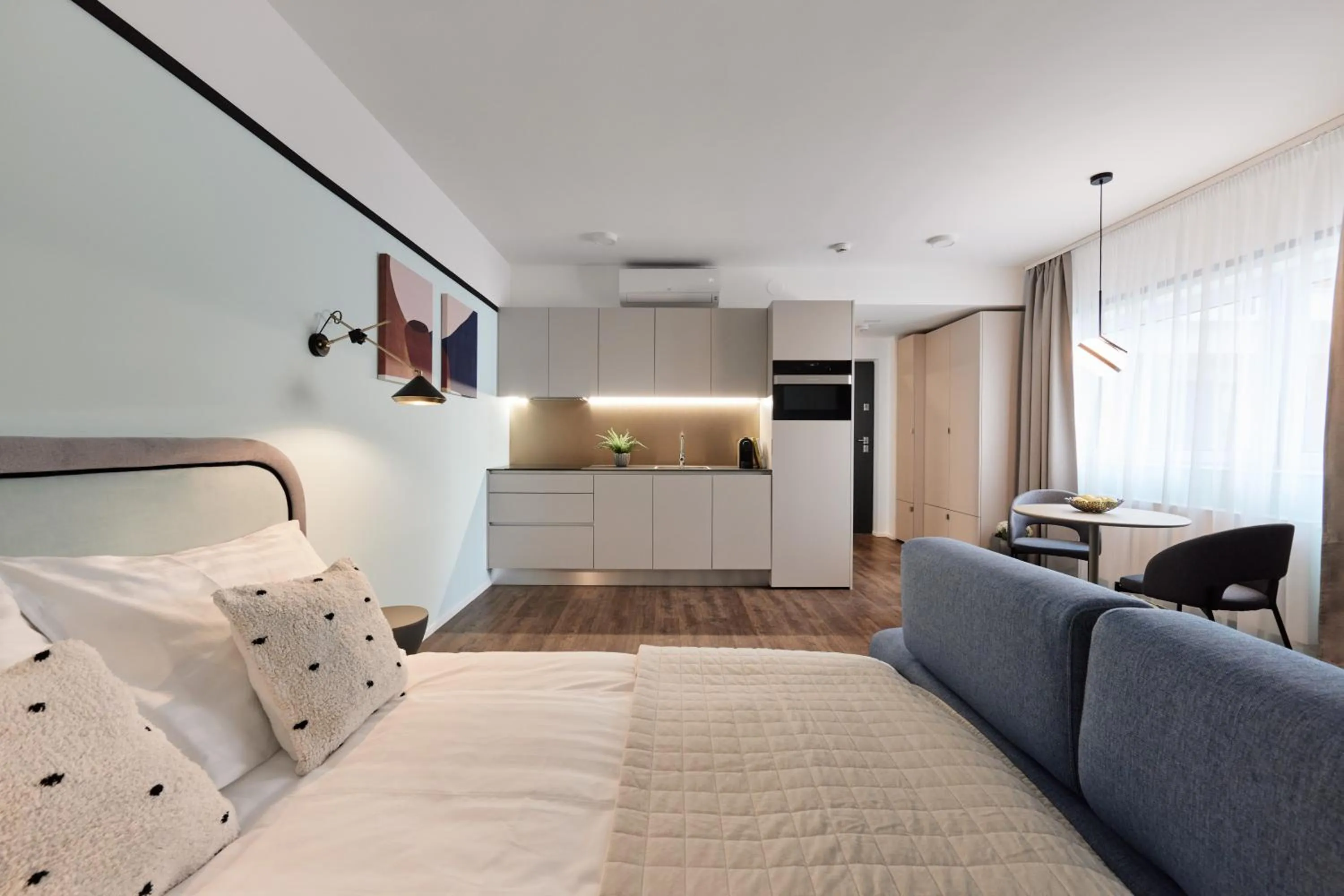 Bed in The Amberlyn Suite Hotel