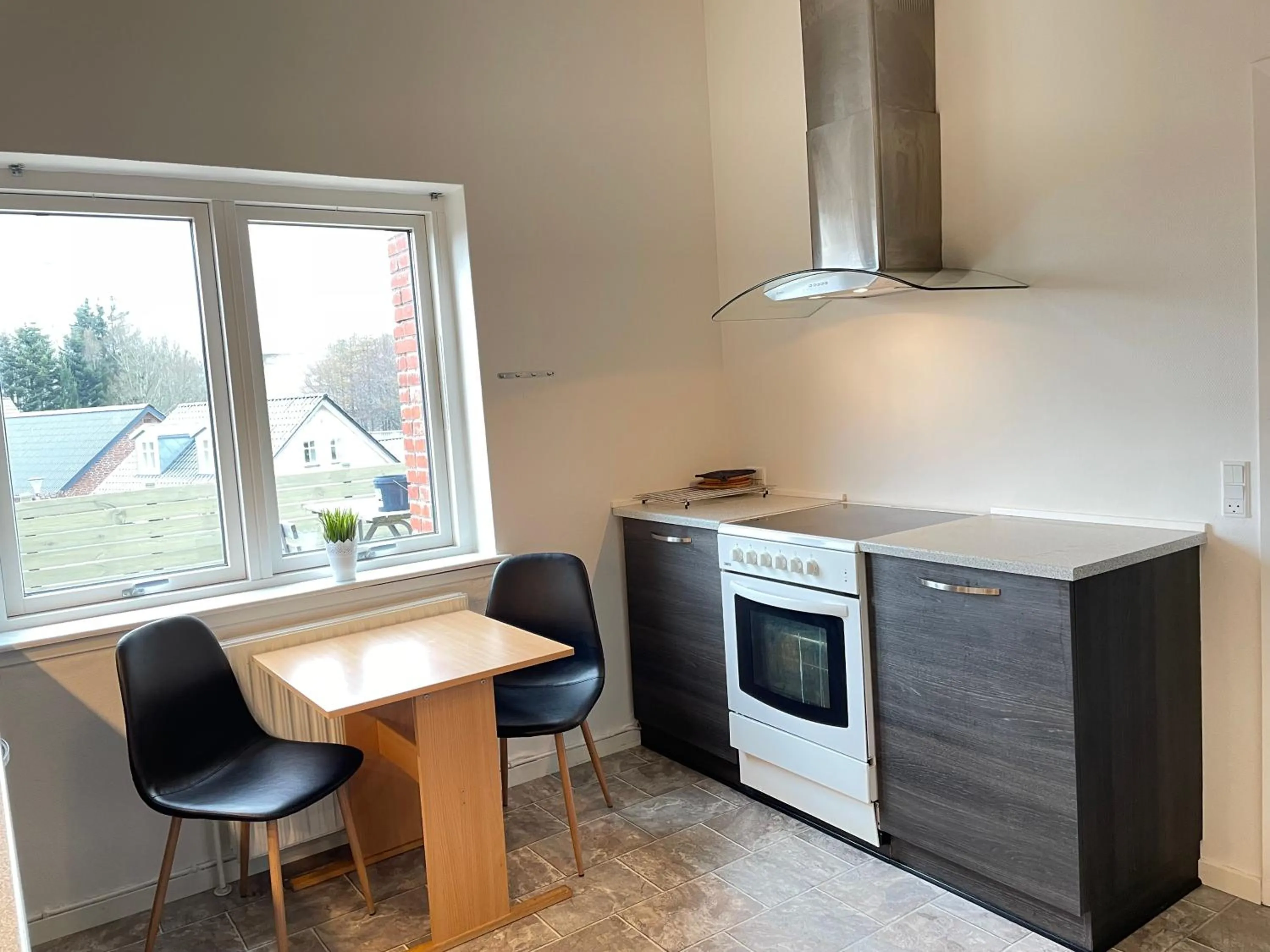 Kitchen or kitchenette in rooms for rent Andersen Invest