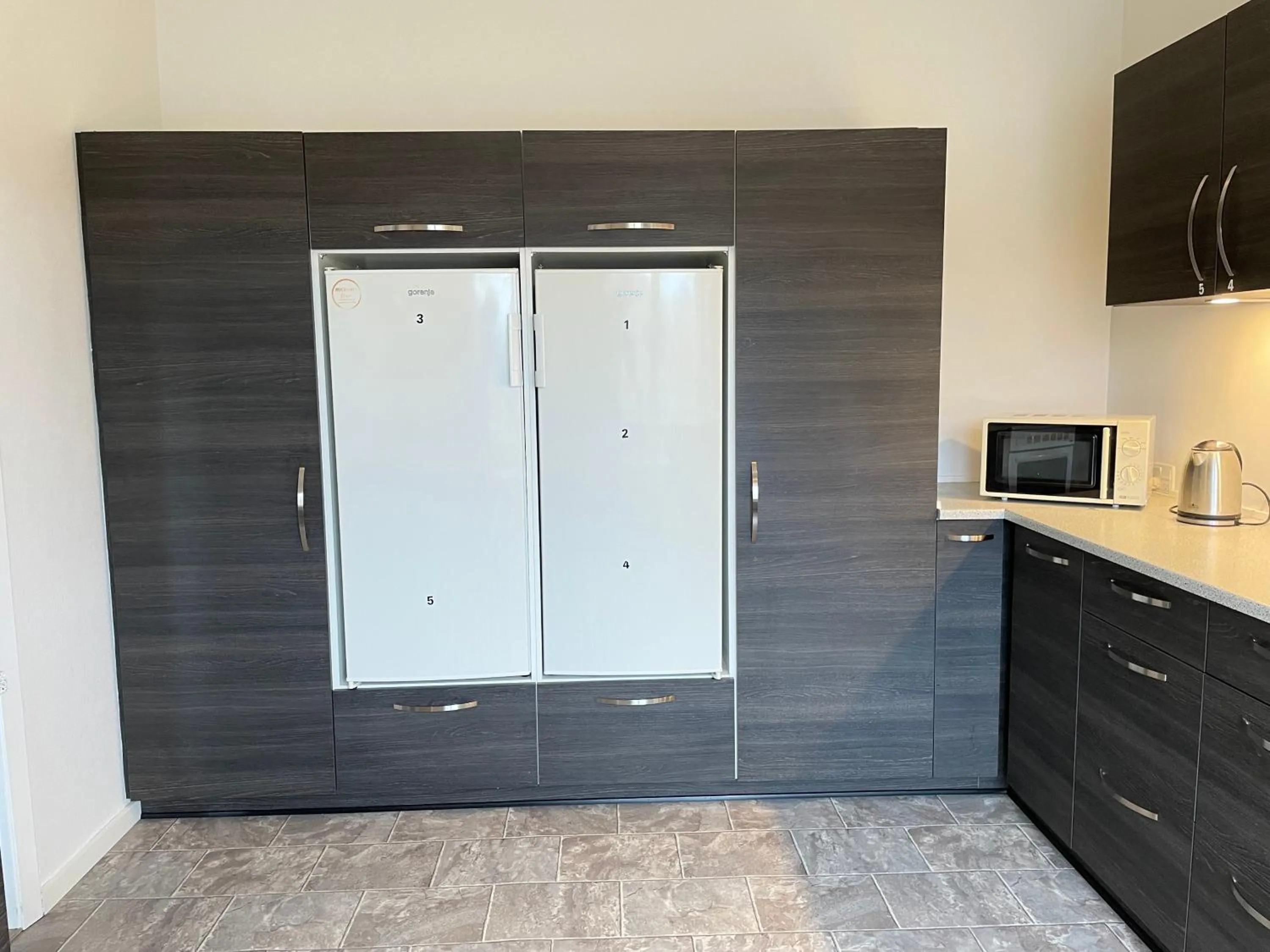 Kitchen or kitchenette in rooms for rent Andersen Invest