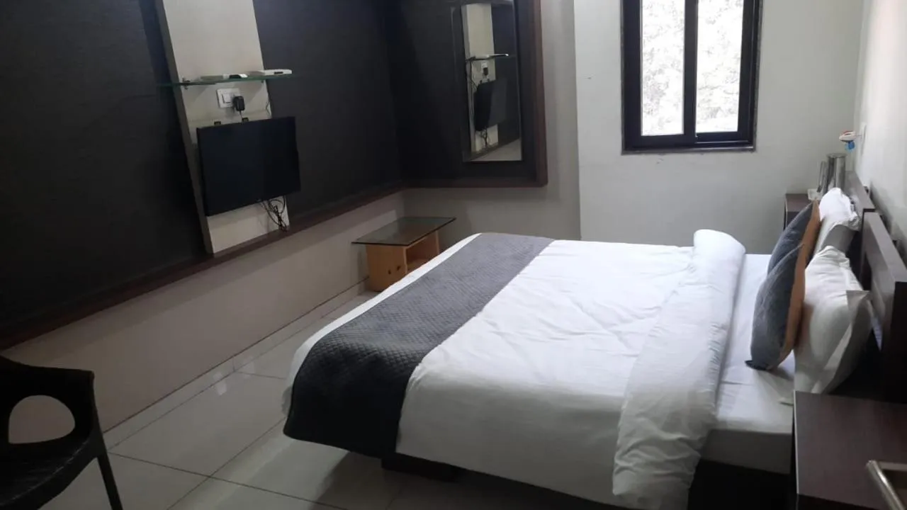 Bed in Indrani Hotel