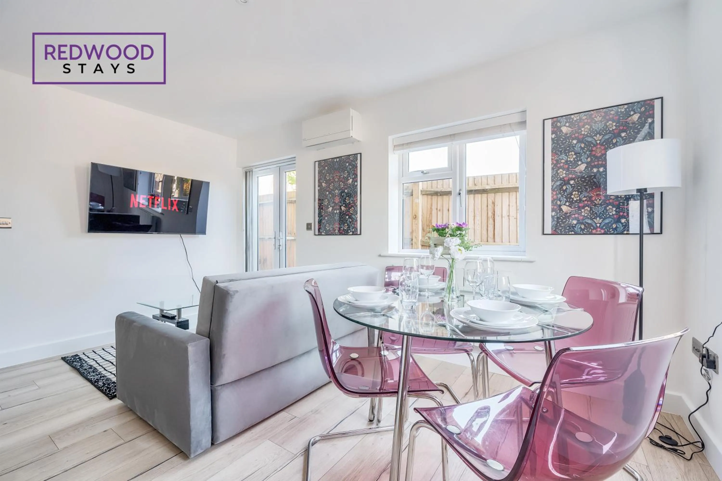 TV and multimedia in Modern Serviced Apartments For Contractors & Families with Free Parking, WiFi & Netflix By Redwood Stays