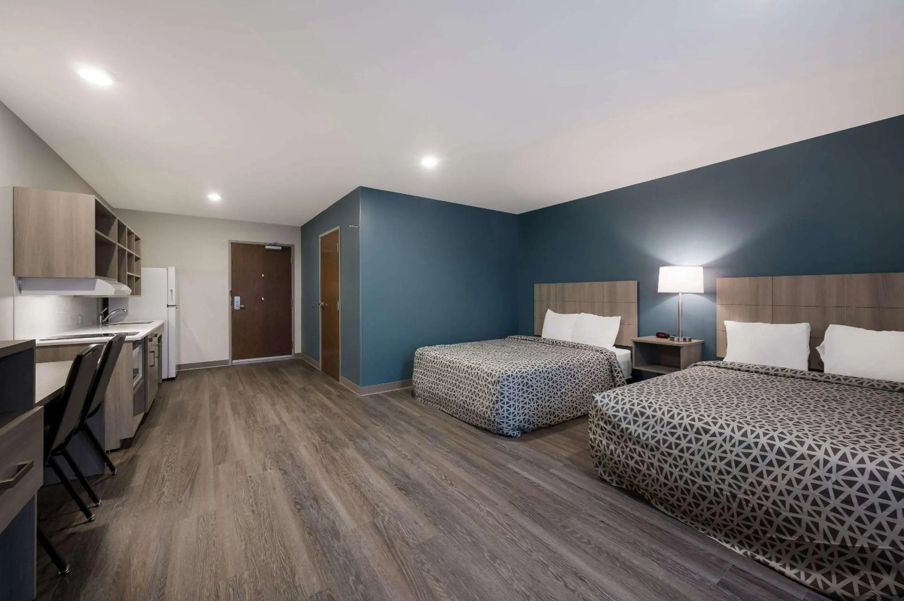 View (from property/room), Bed in WoodSpring Suites Wixom - Novi