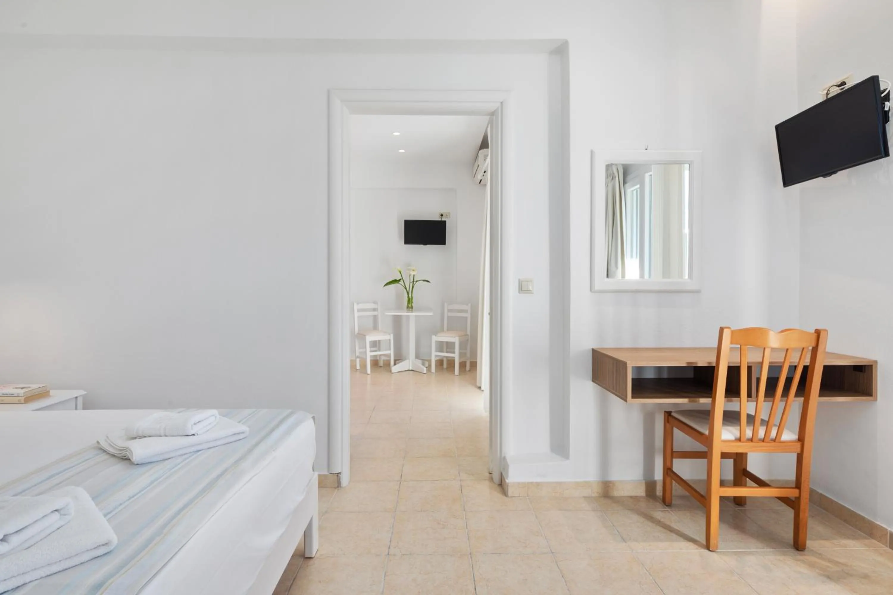 Bed in Bella Vista Beach Hotel