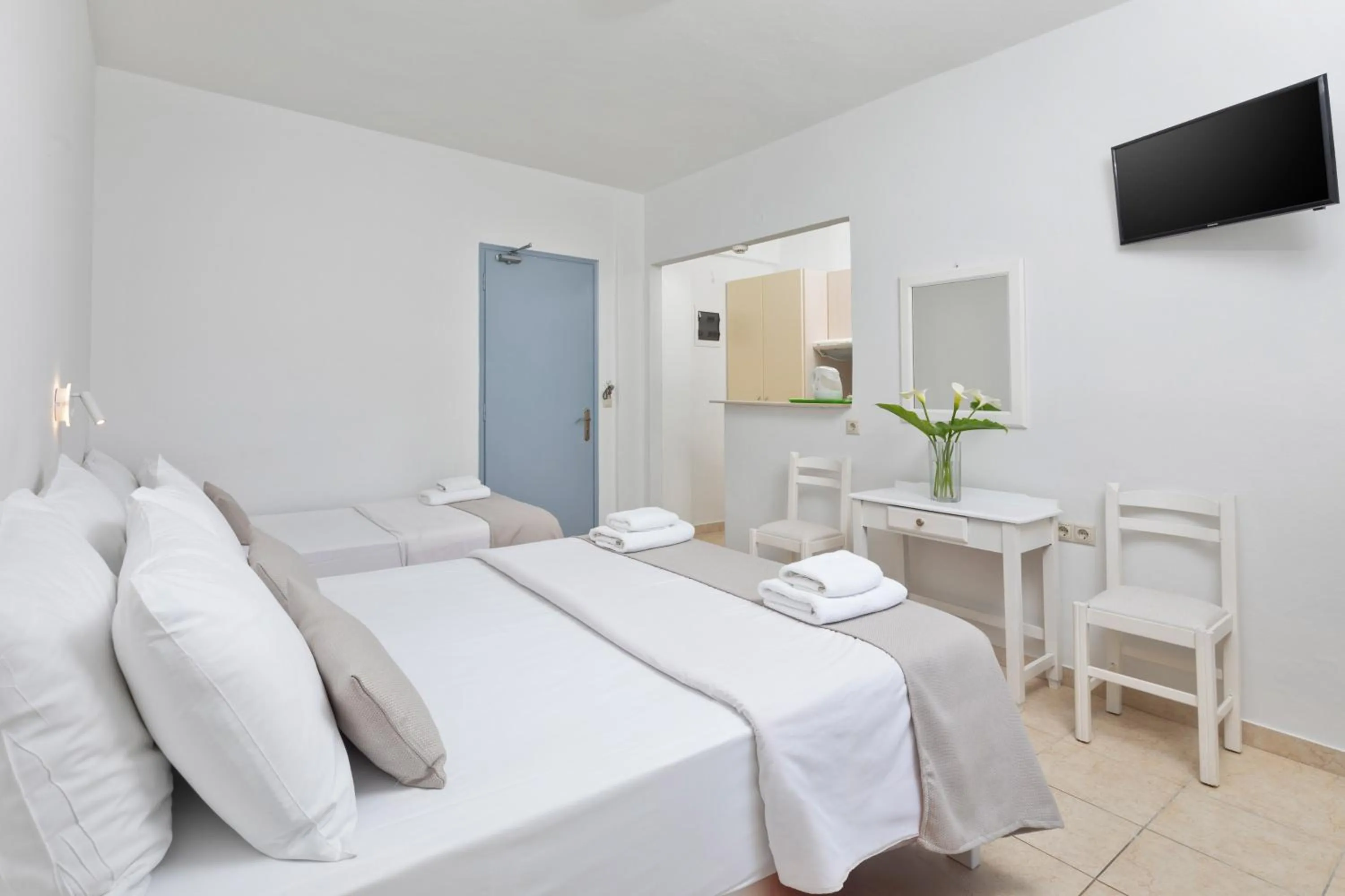 Bed in Bella Vista Beach Hotel