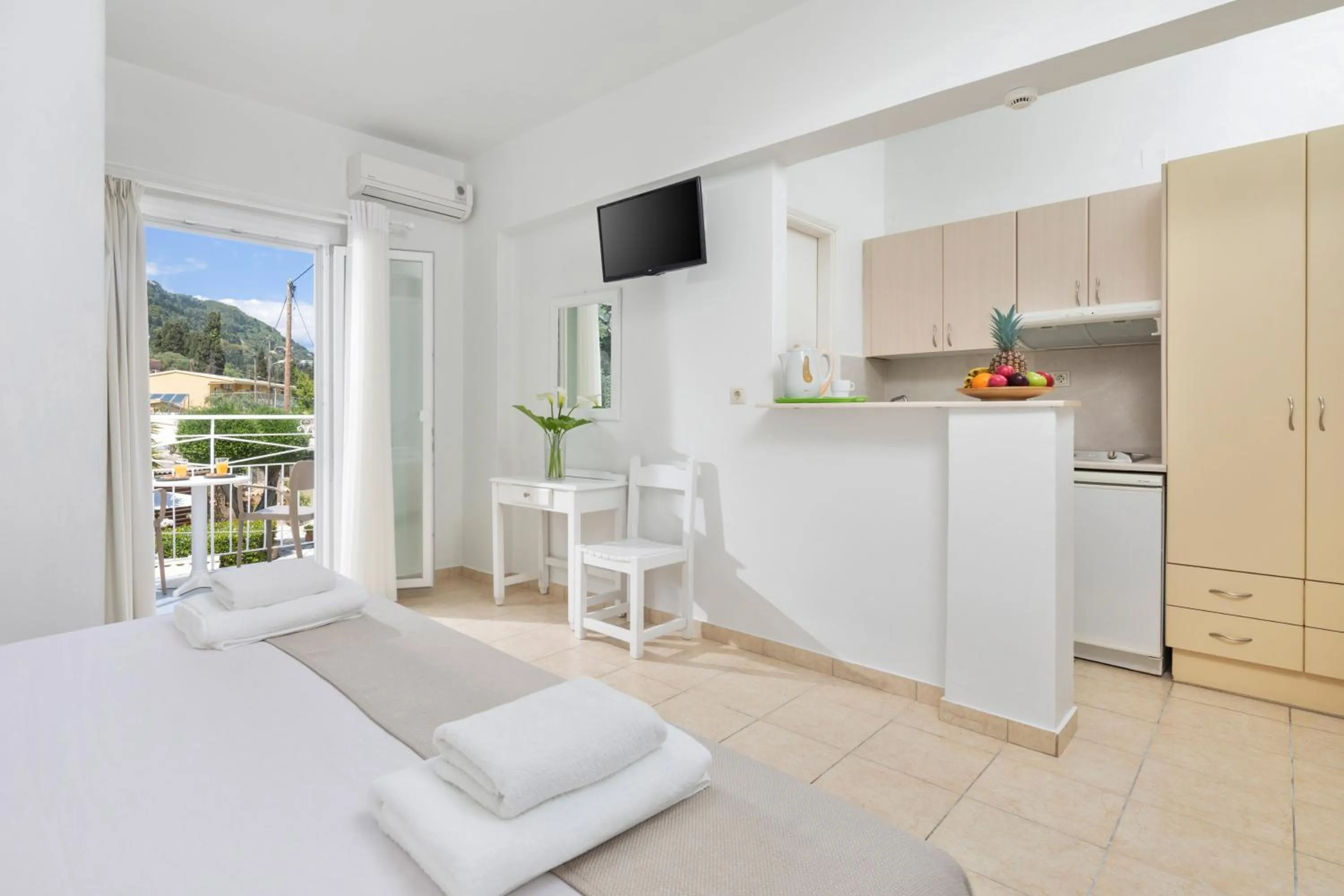 Bed in Bella Vista Beach Hotel