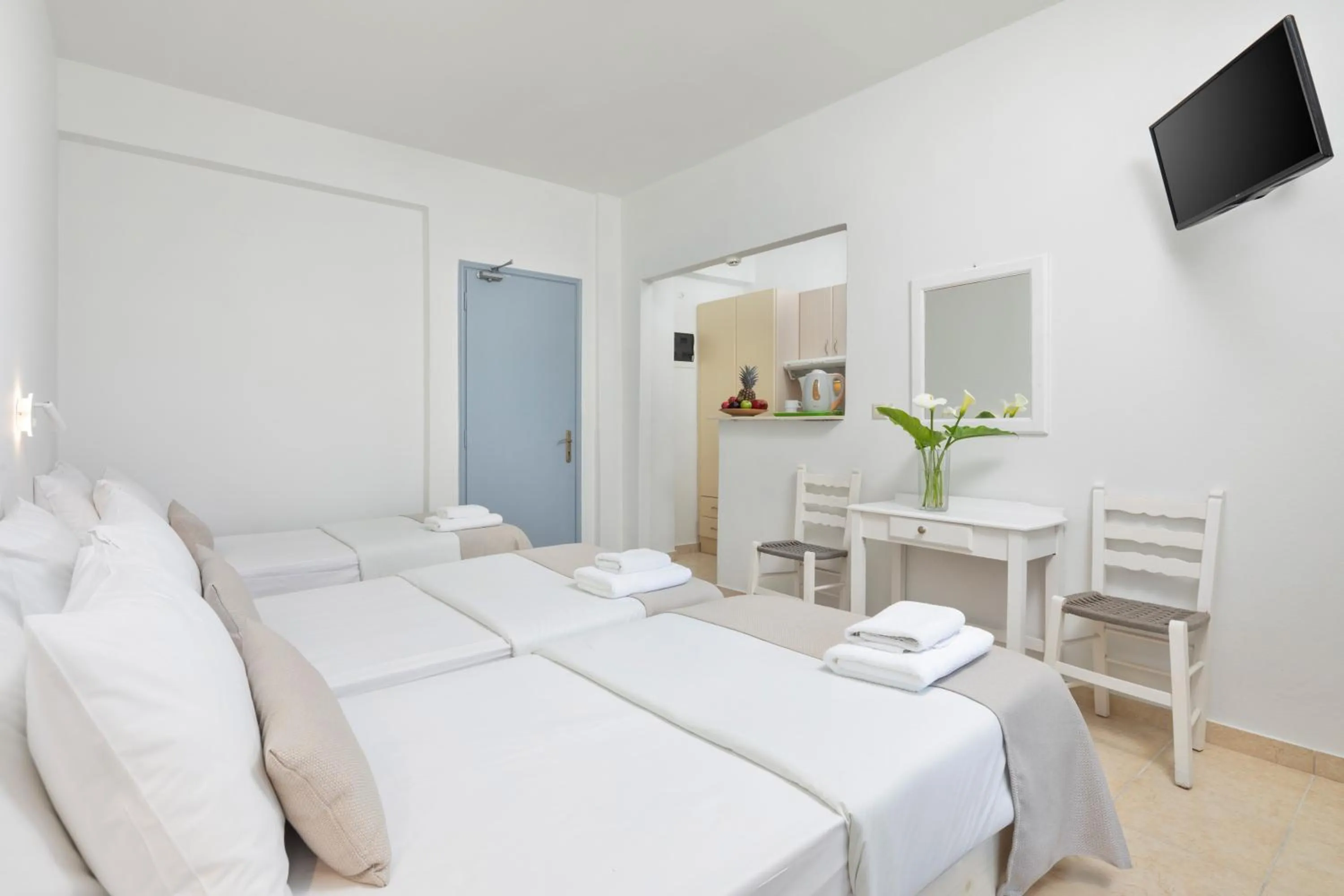 Bed in Bella Vista Beach Hotel