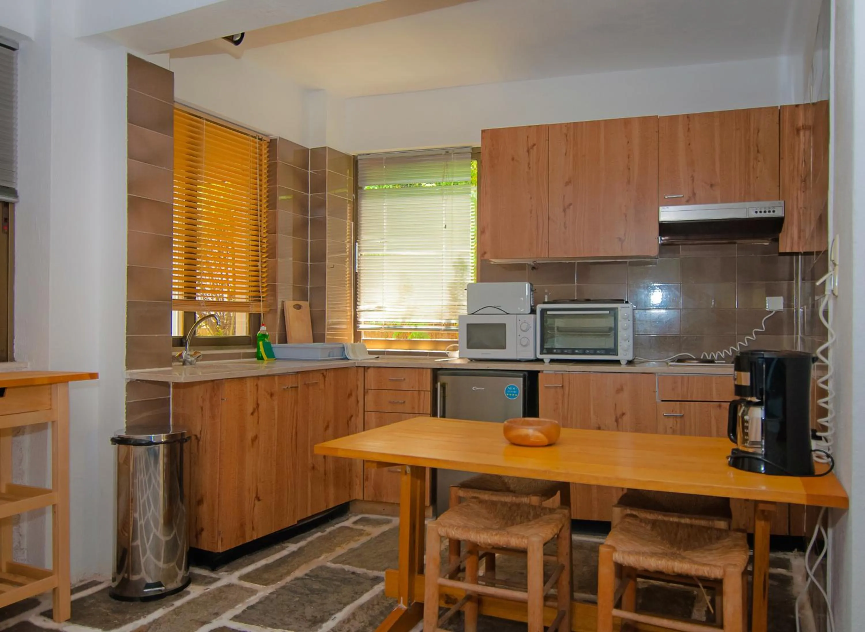 Kitchen or kitchenette in Apollonia Hotel Apartments
