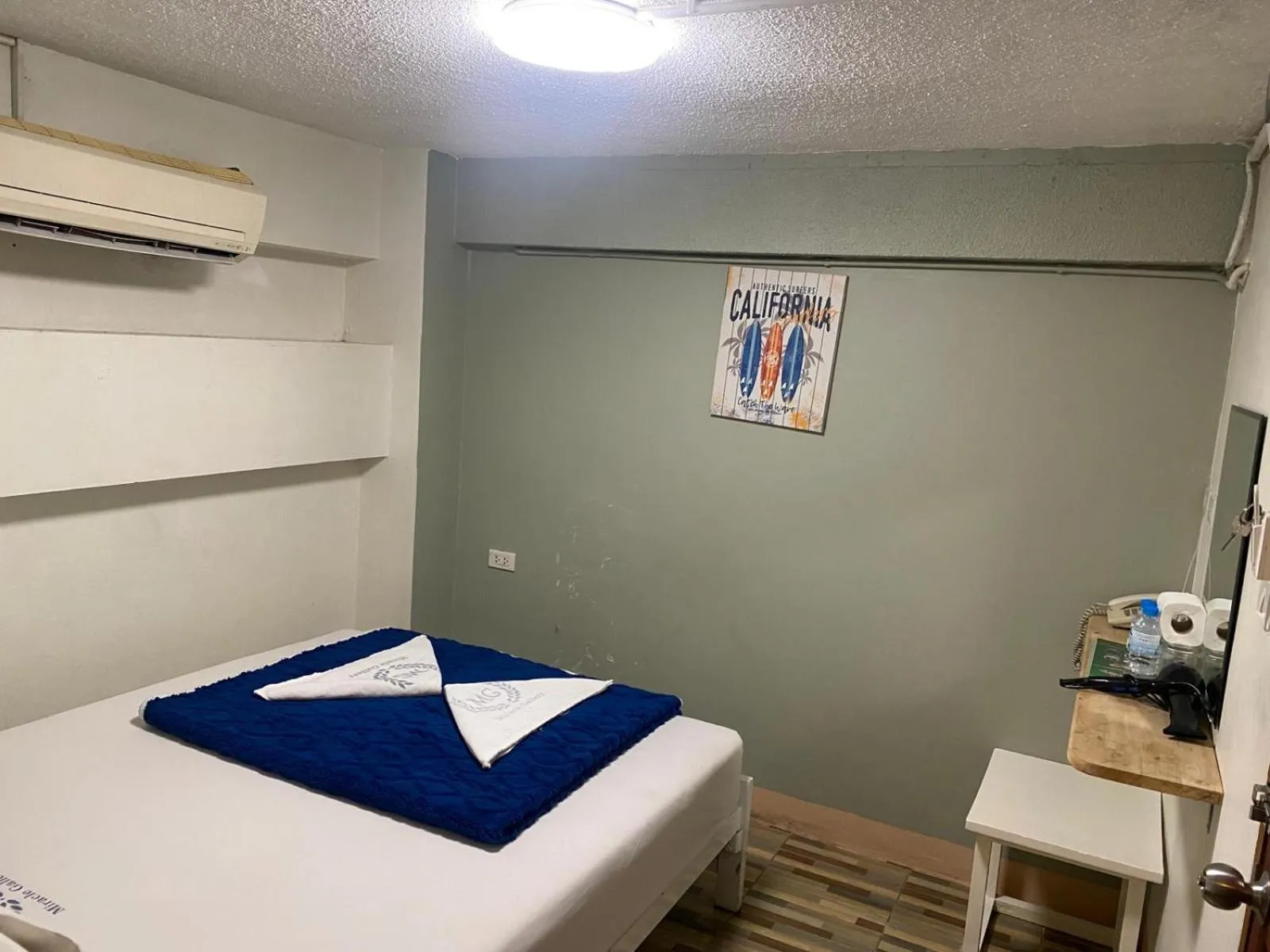 Bed in Miracle Gallery Hotel