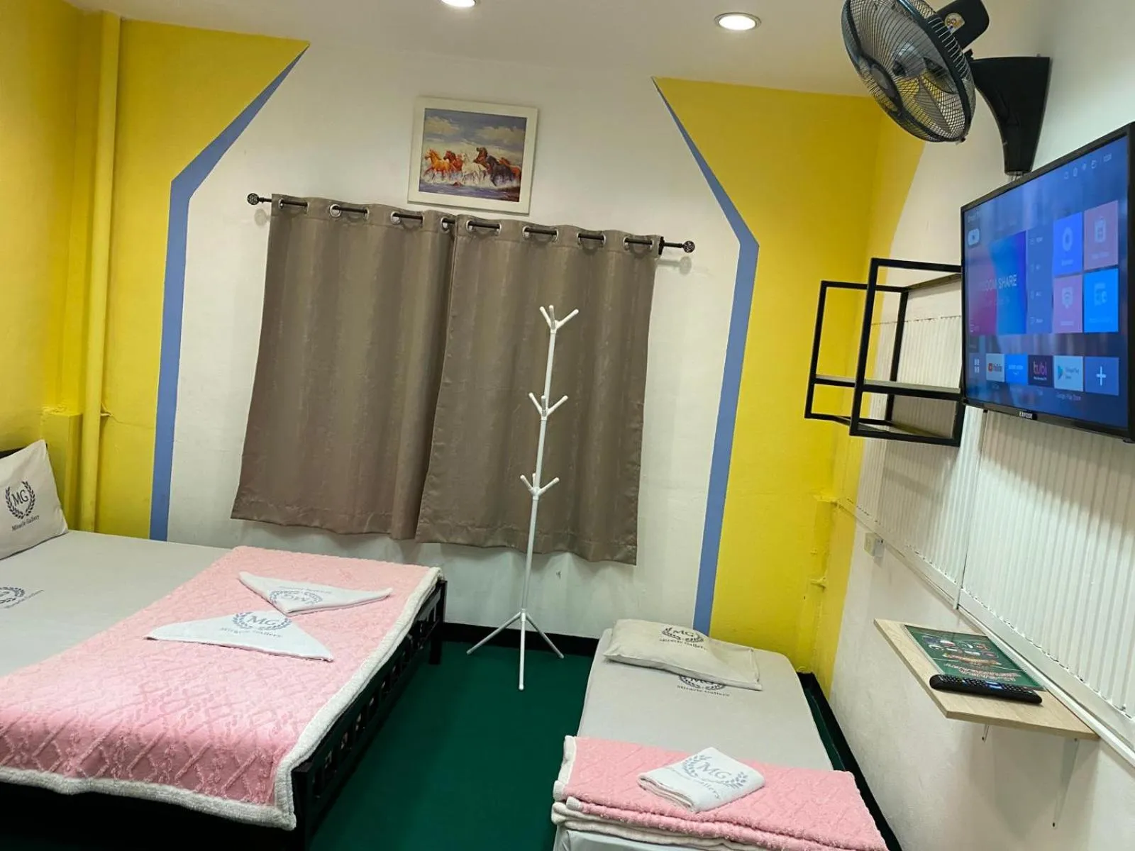 Bed in Miracle Gallery Hotel