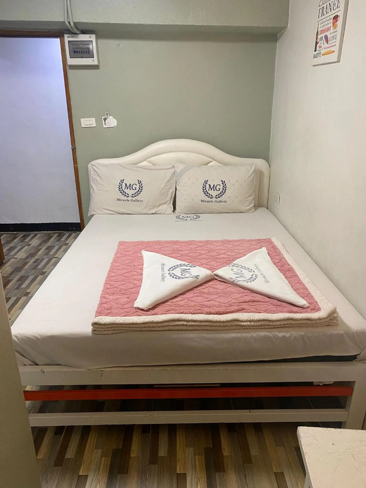 Bed in Miracle Gallery Hotel