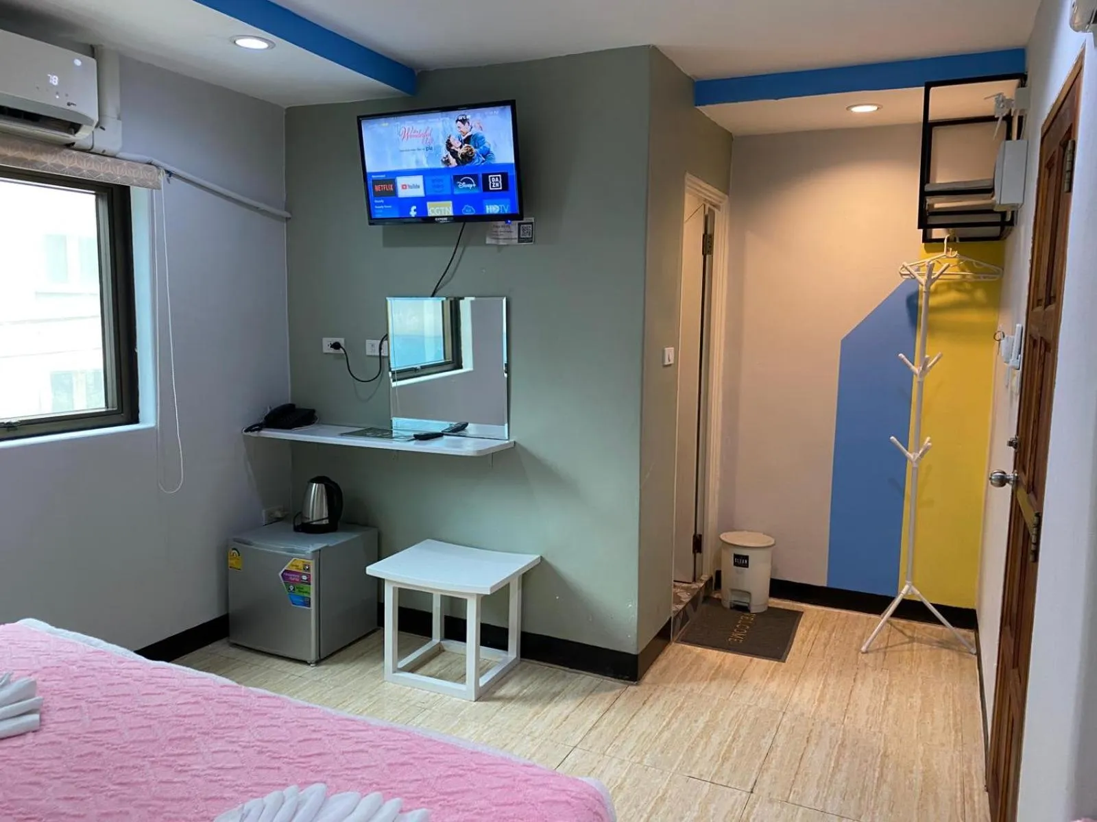 Bed in Miracle Gallery Hotel