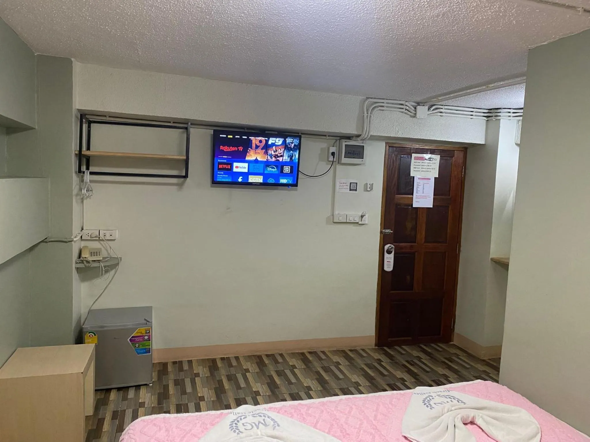 Bed in Miracle Gallery Hotel