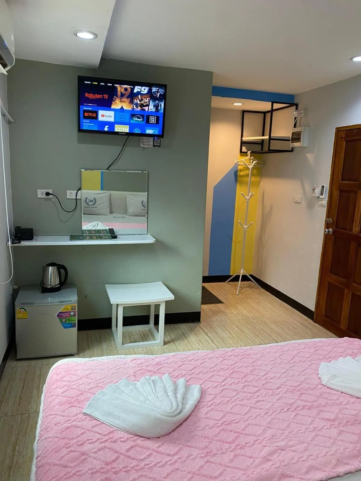 Bed in Miracle Gallery Hotel