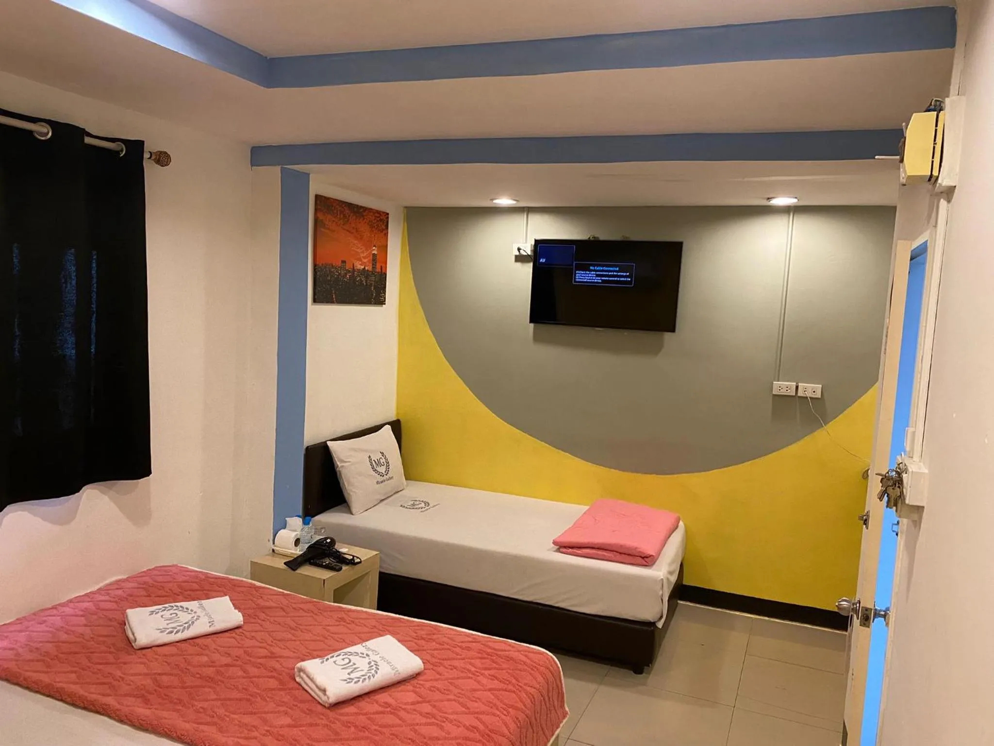 Bed in Miracle Gallery Hotel