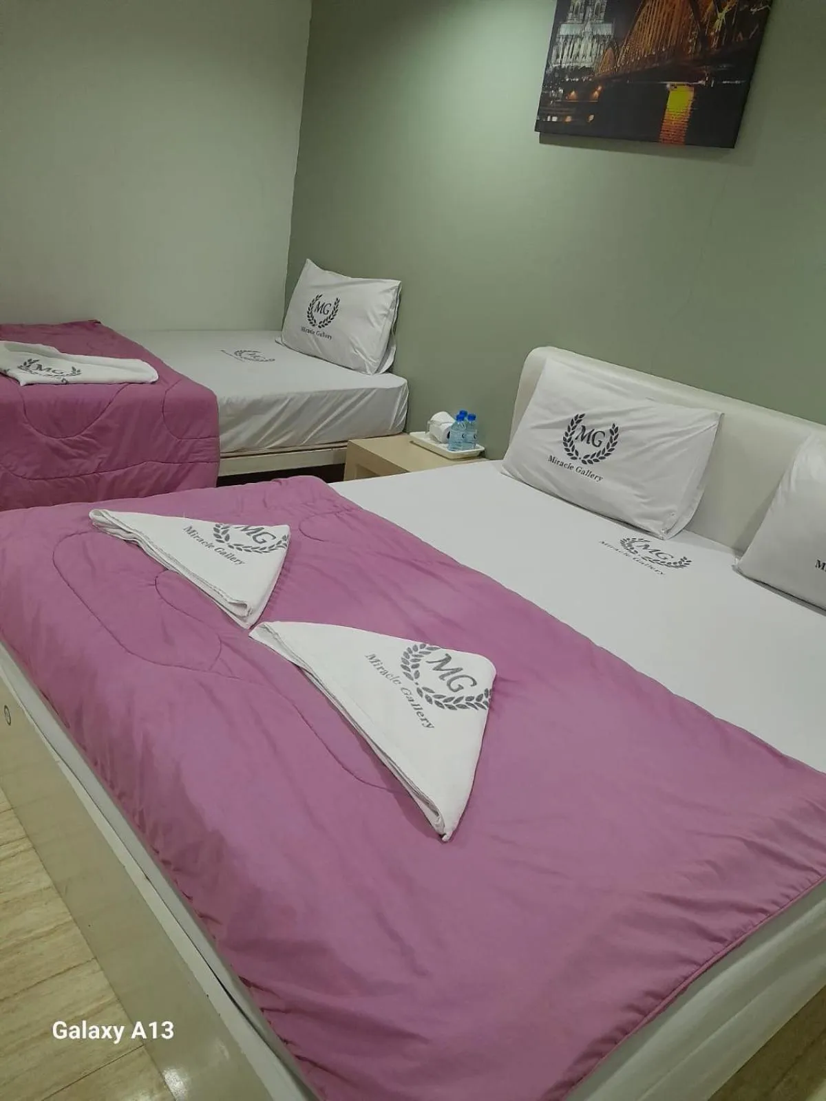 Bed in Miracle Gallery Hotel