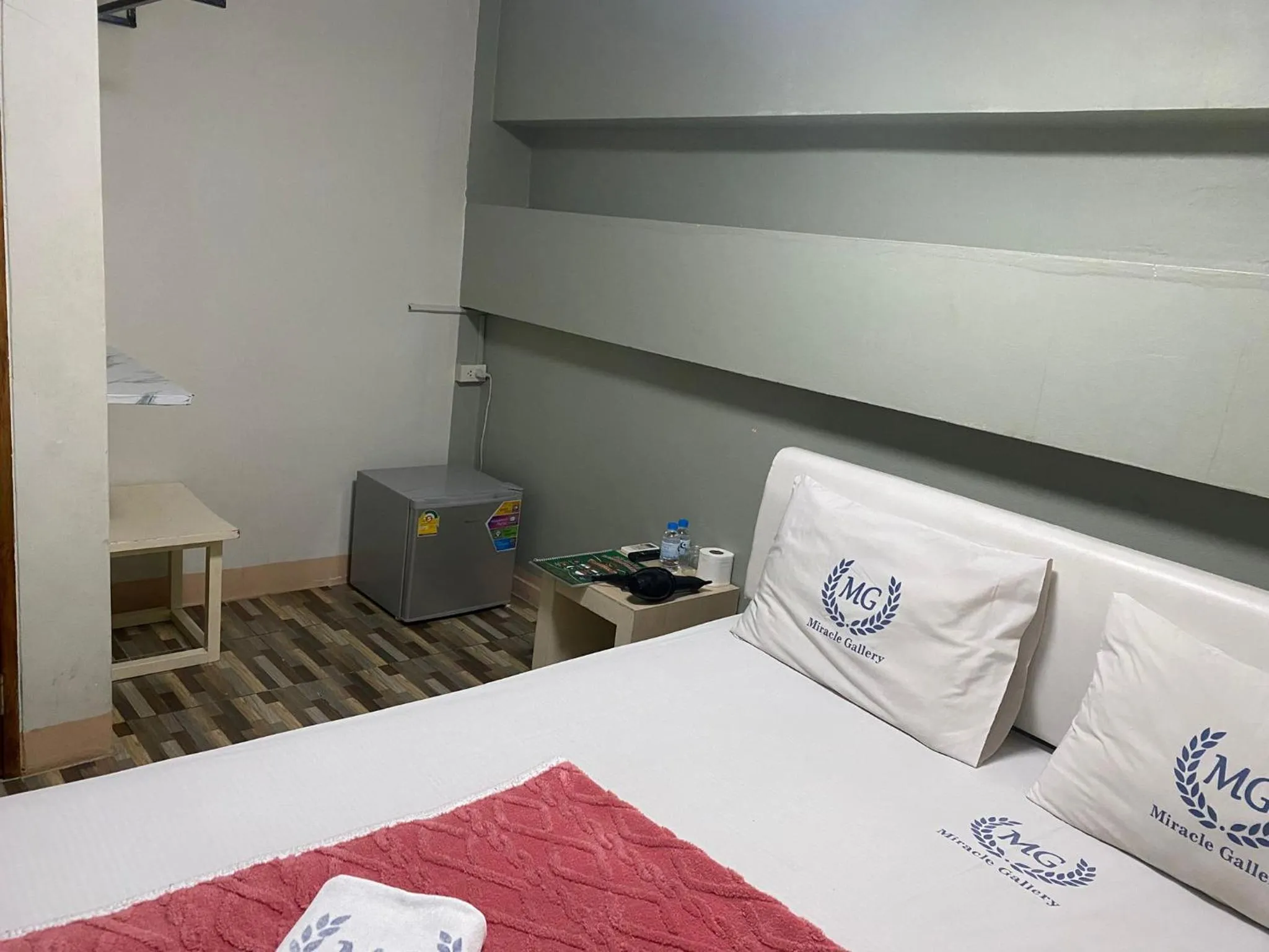 Bed in Miracle Gallery Hotel