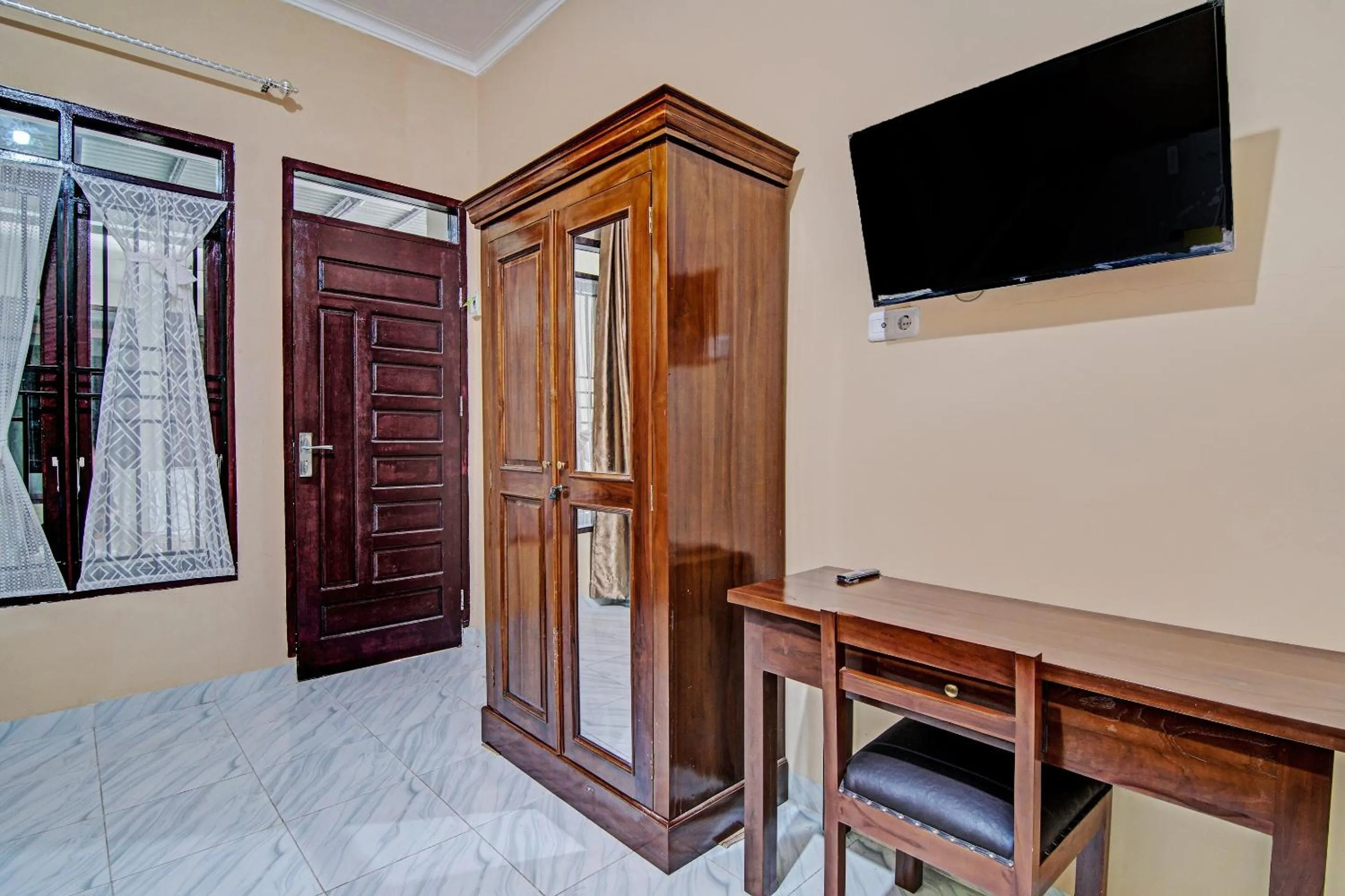 Bedroom in Hotel O Sandira Syariah