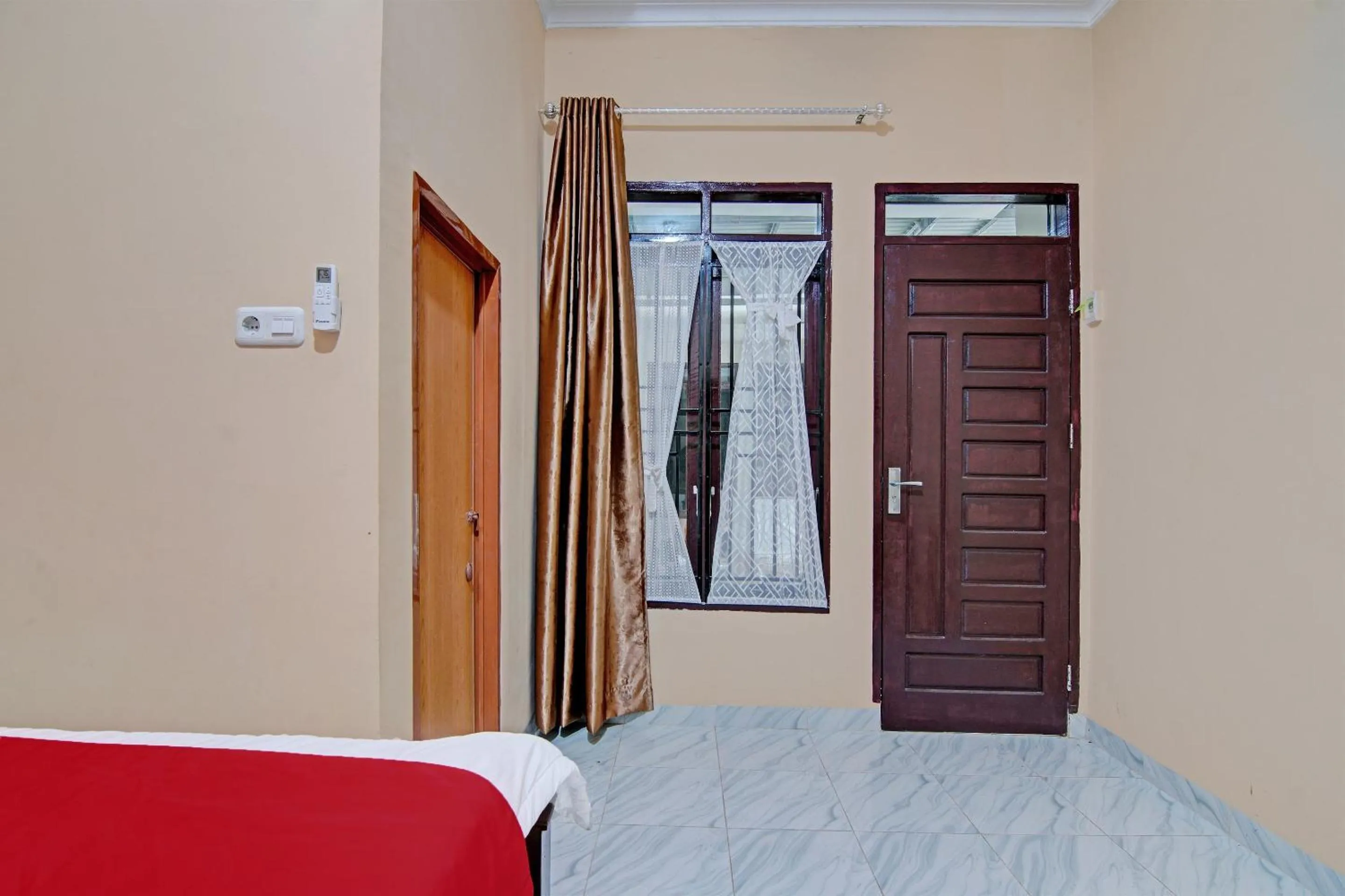 Bedroom in Hotel O Sandira Syariah