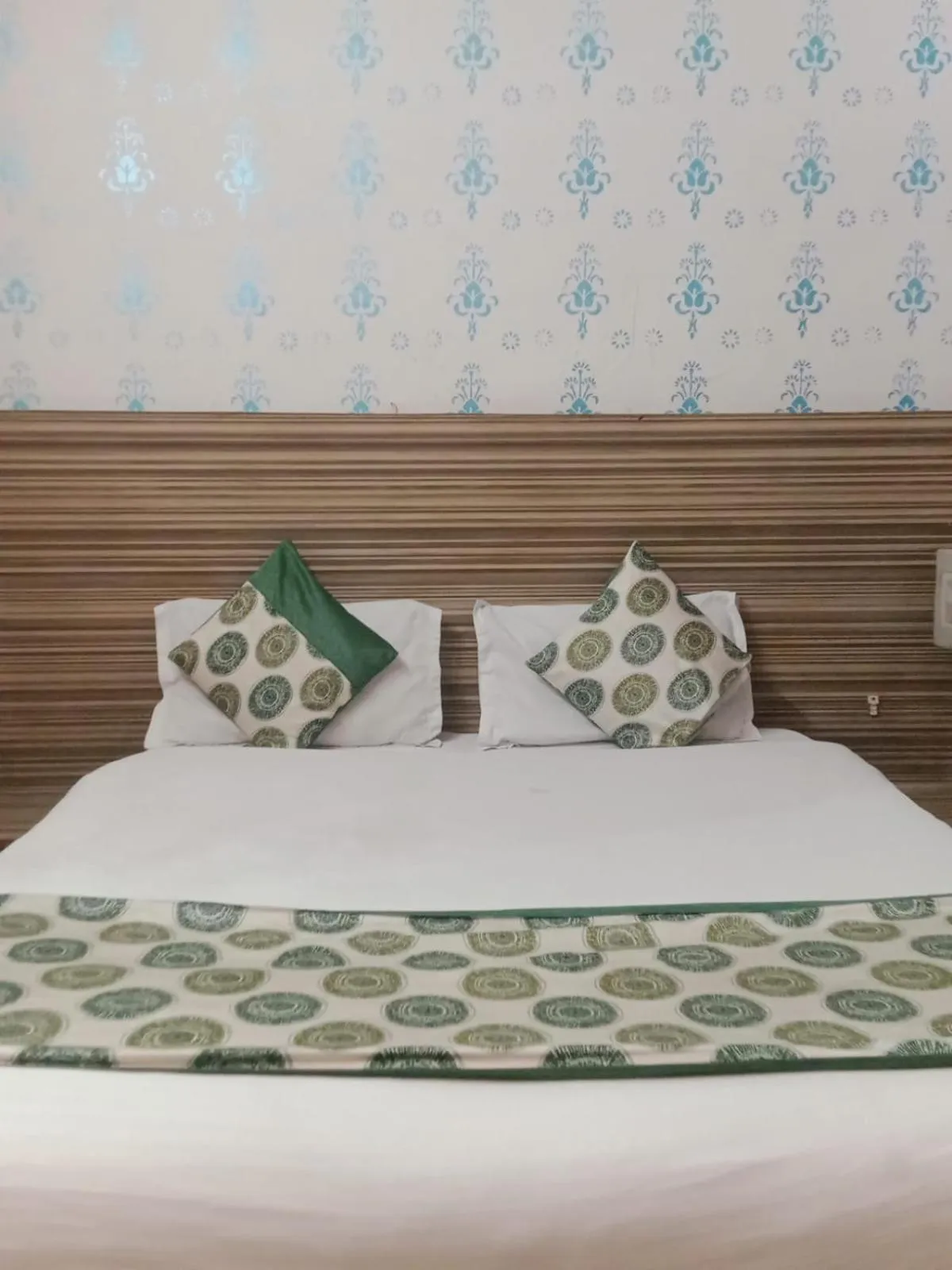 Bed in Hotel Atithi Residency