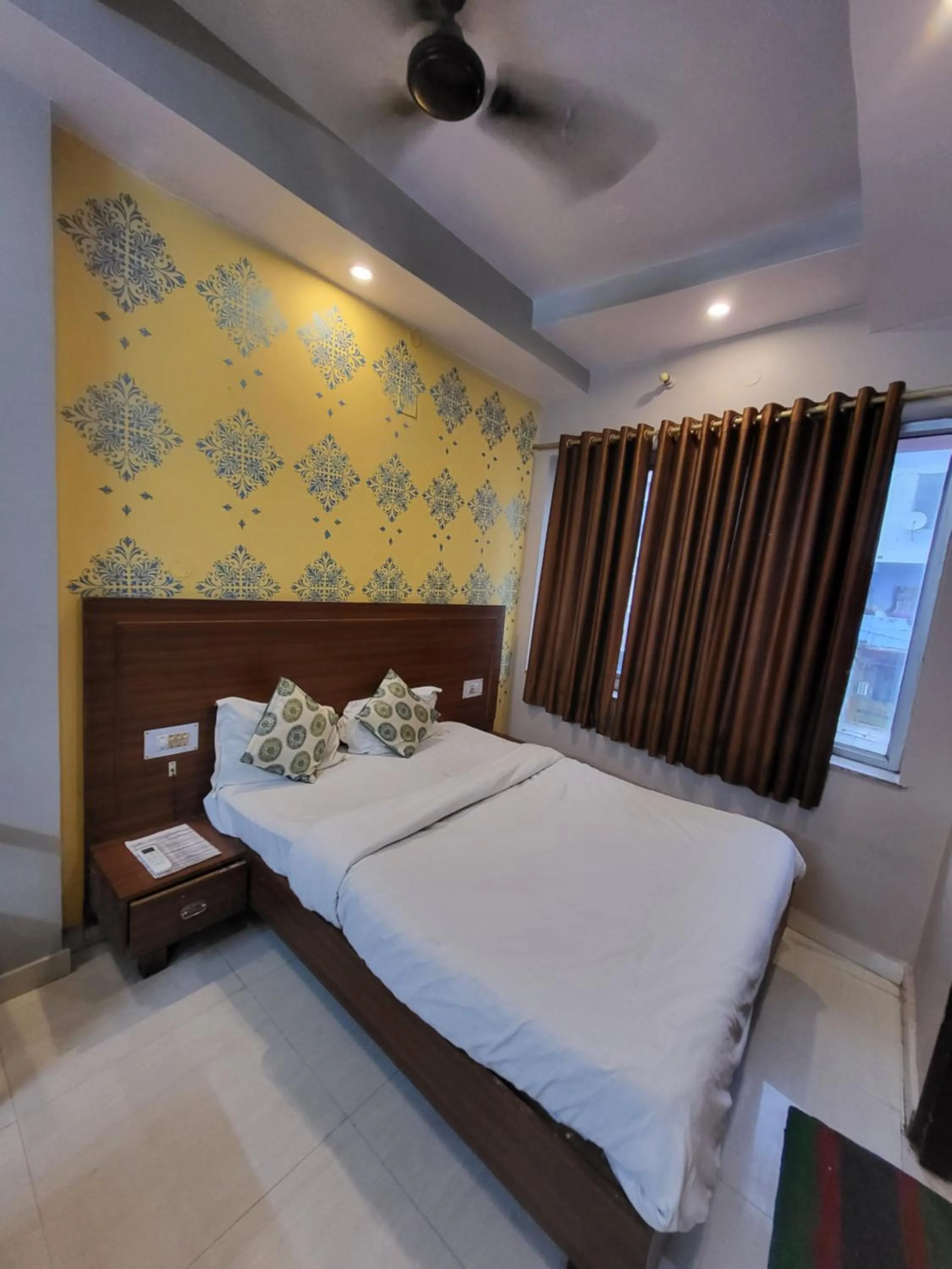 Bed in Hotel Atithi Residency