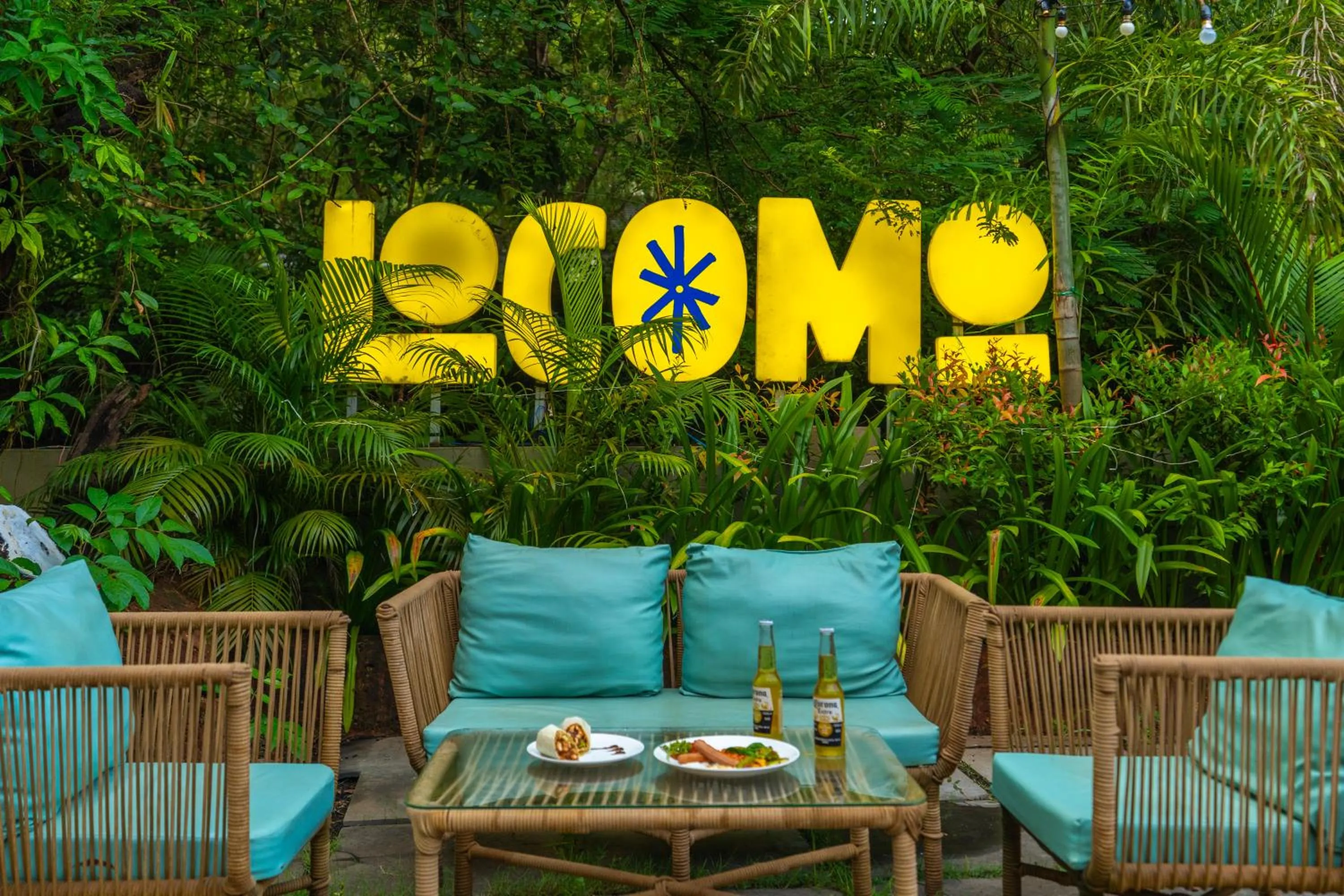 Property logo or sign in Locomo Boutique, Morjim - Cozy tropical stay, near beach
