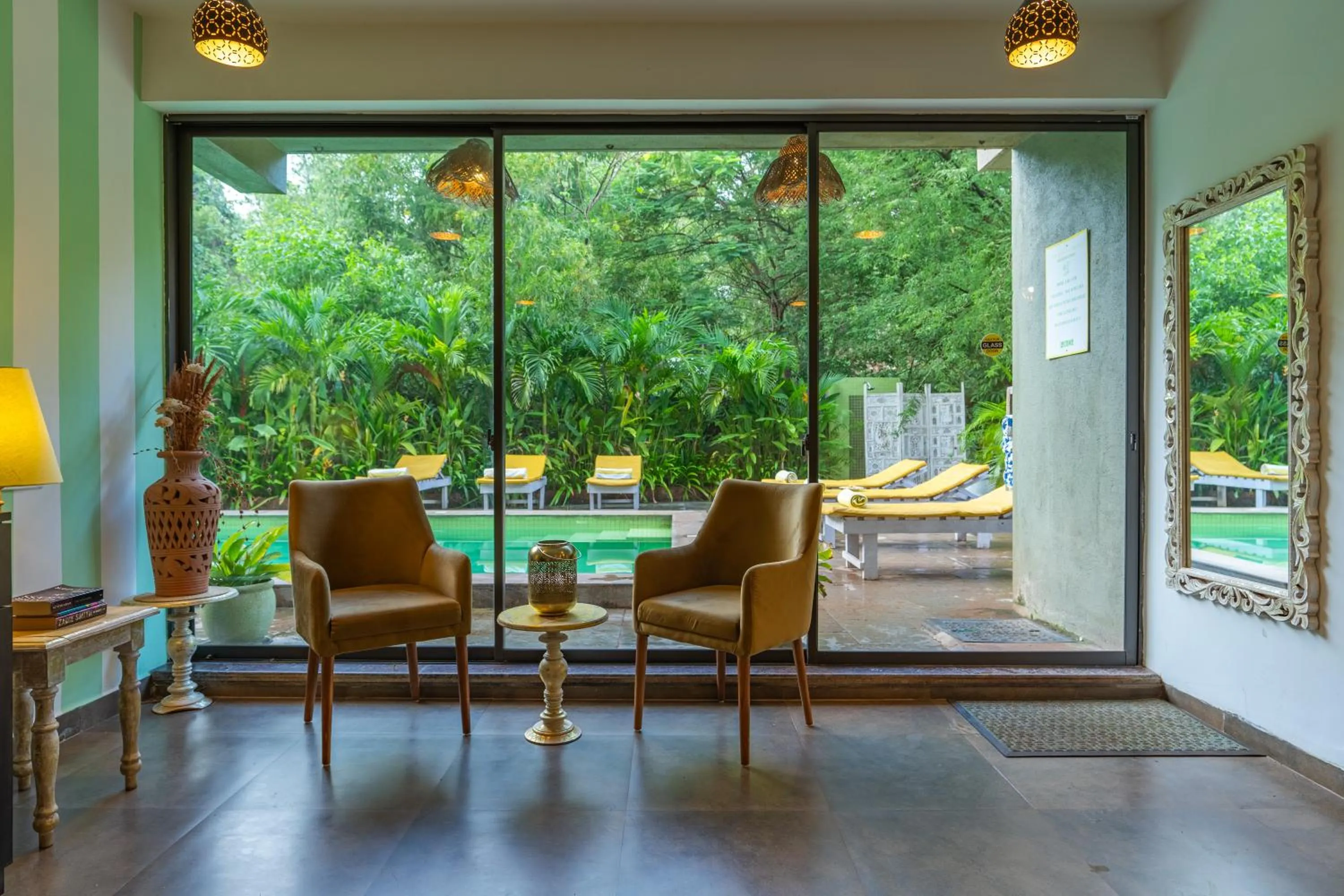 Seating area in Locomo Boutique, Morjim - Cozy tropical stay, near beach