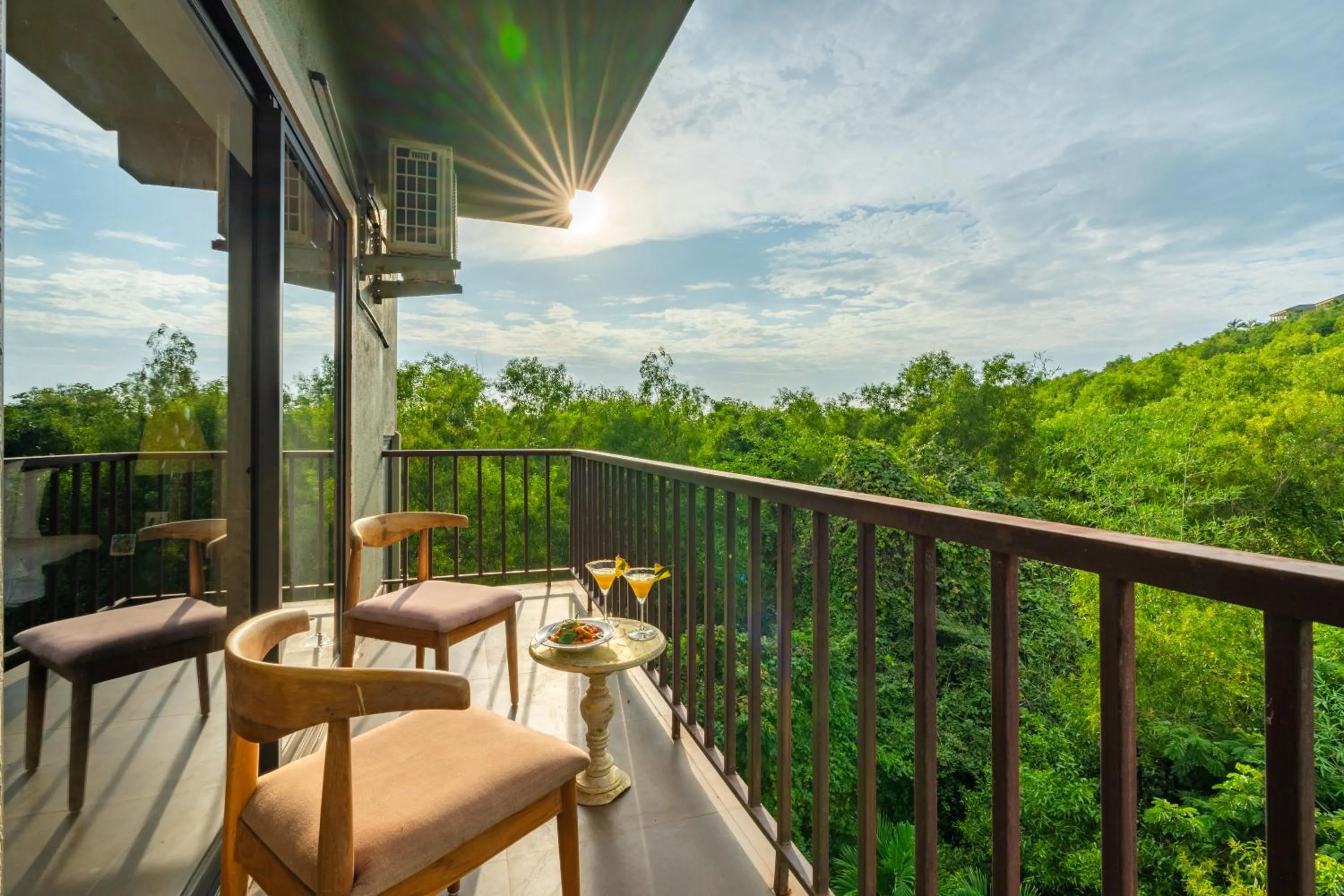 Balcony/Terrace in Locomo Boutique, Morjim - Cozy tropical stay, near beach