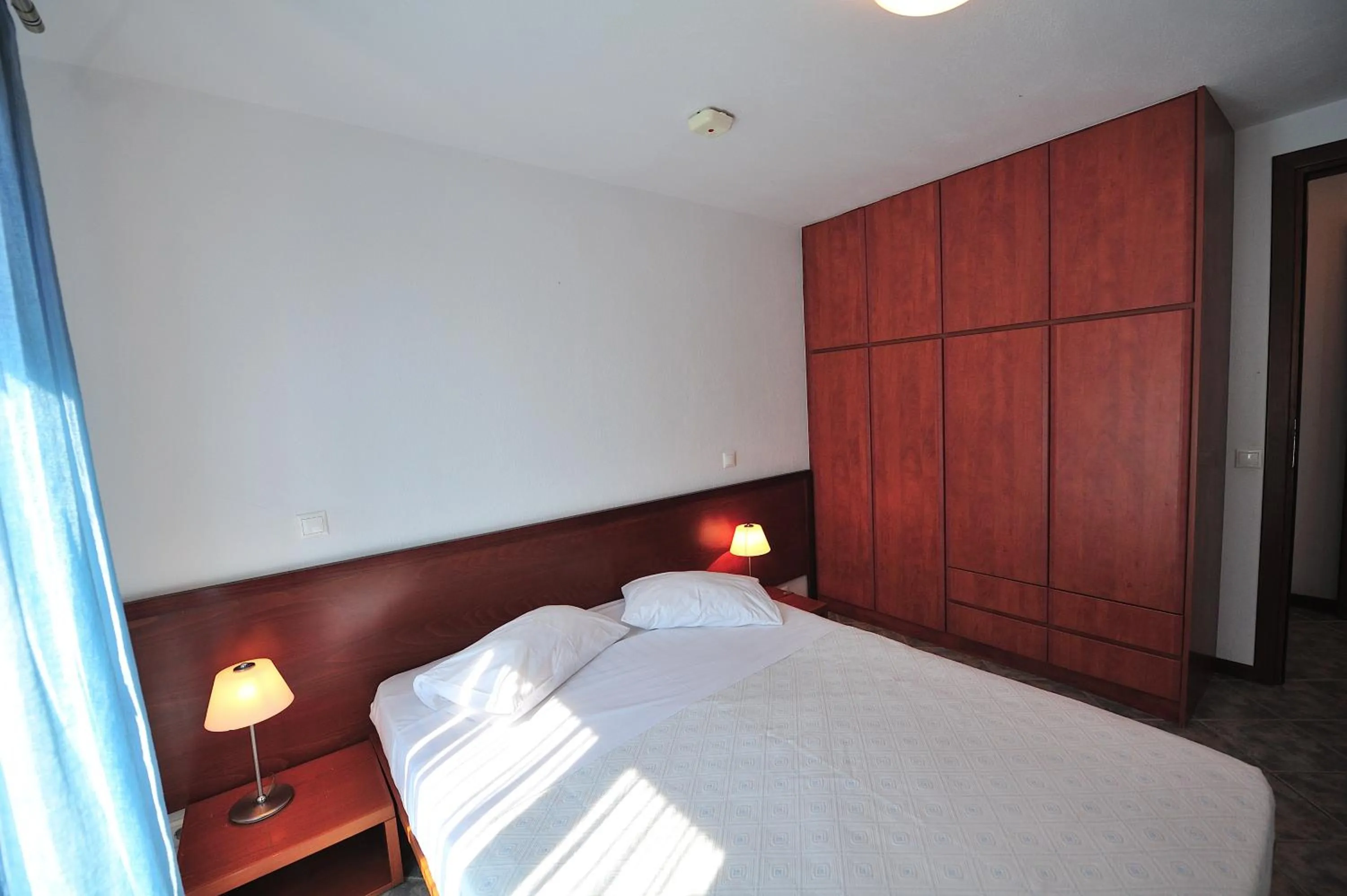 Bed in Eye Q Resort Seaview