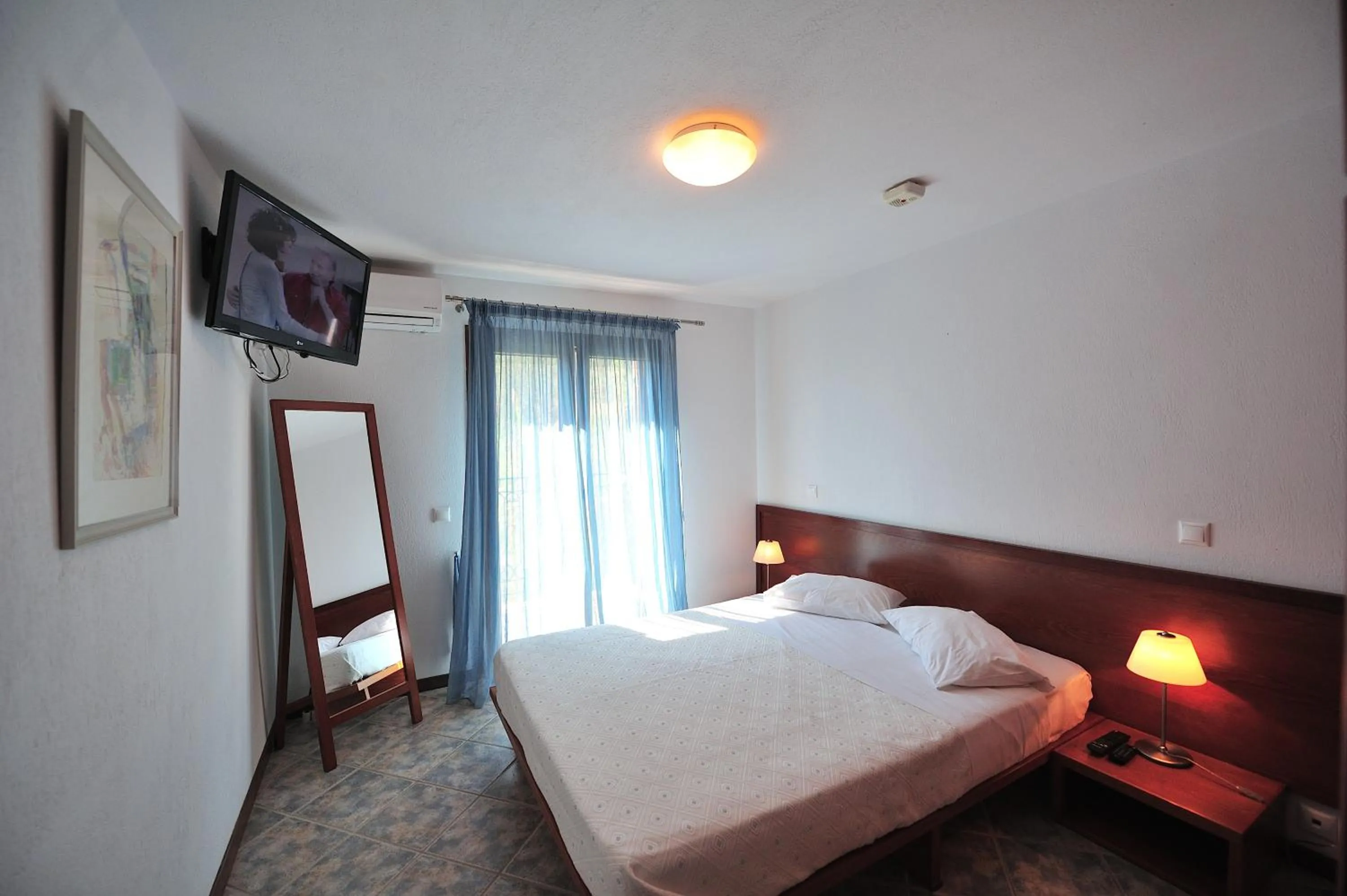 Bed in Eye Q Resort Seaview