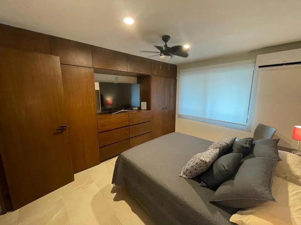 Bed in Departamento Céntrico y Moderno en Cancún.