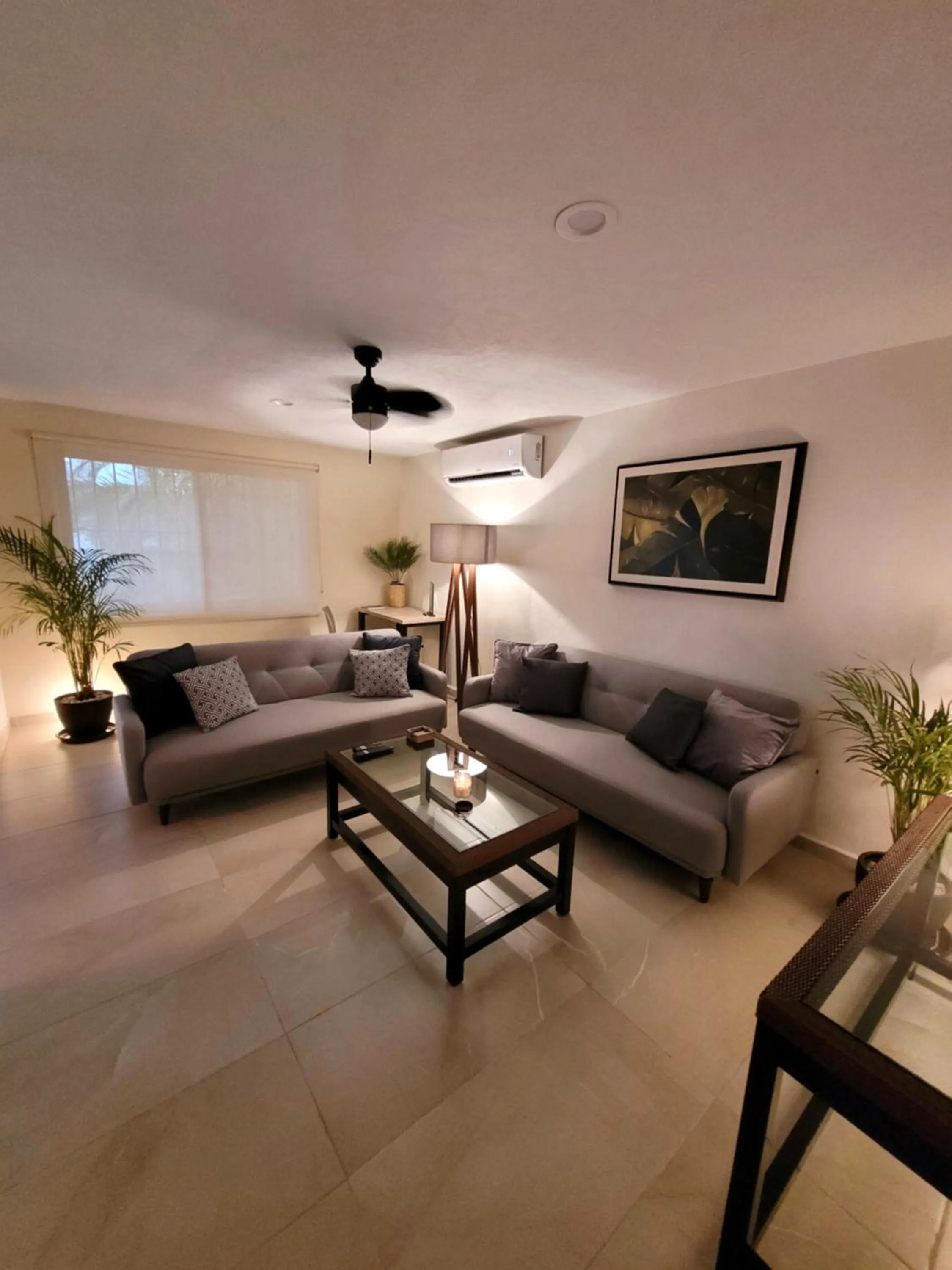 Living room in Departamento Céntrico y Moderno en Cancún.