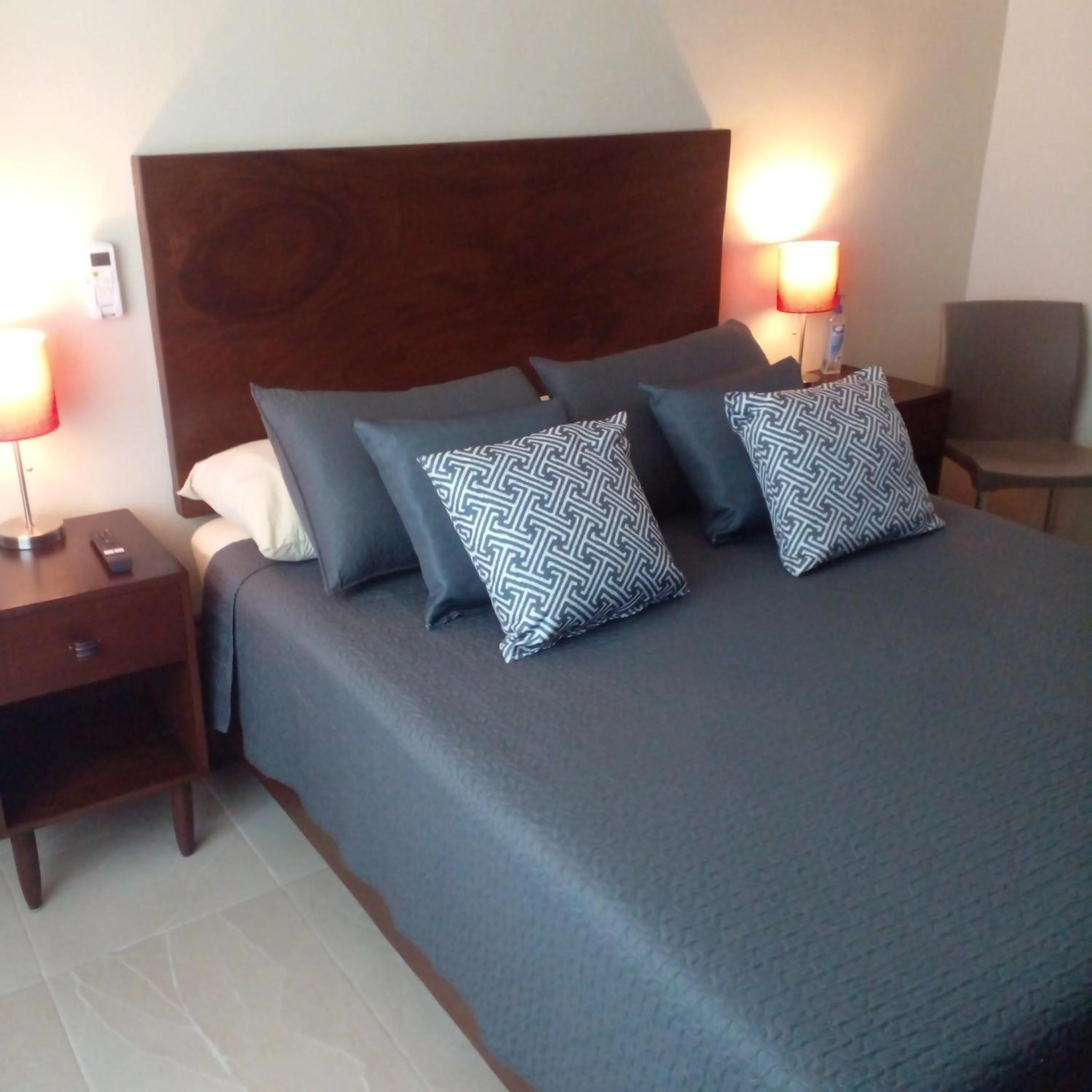 Bed in Departamento Céntrico y Moderno en Cancún.