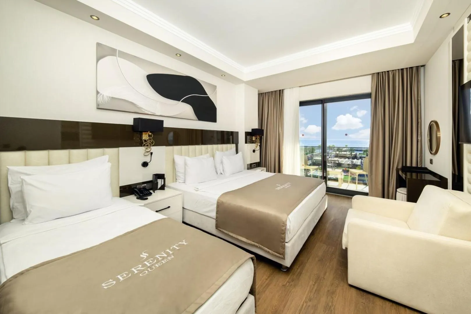 Bed in Serenity Queen Hotel