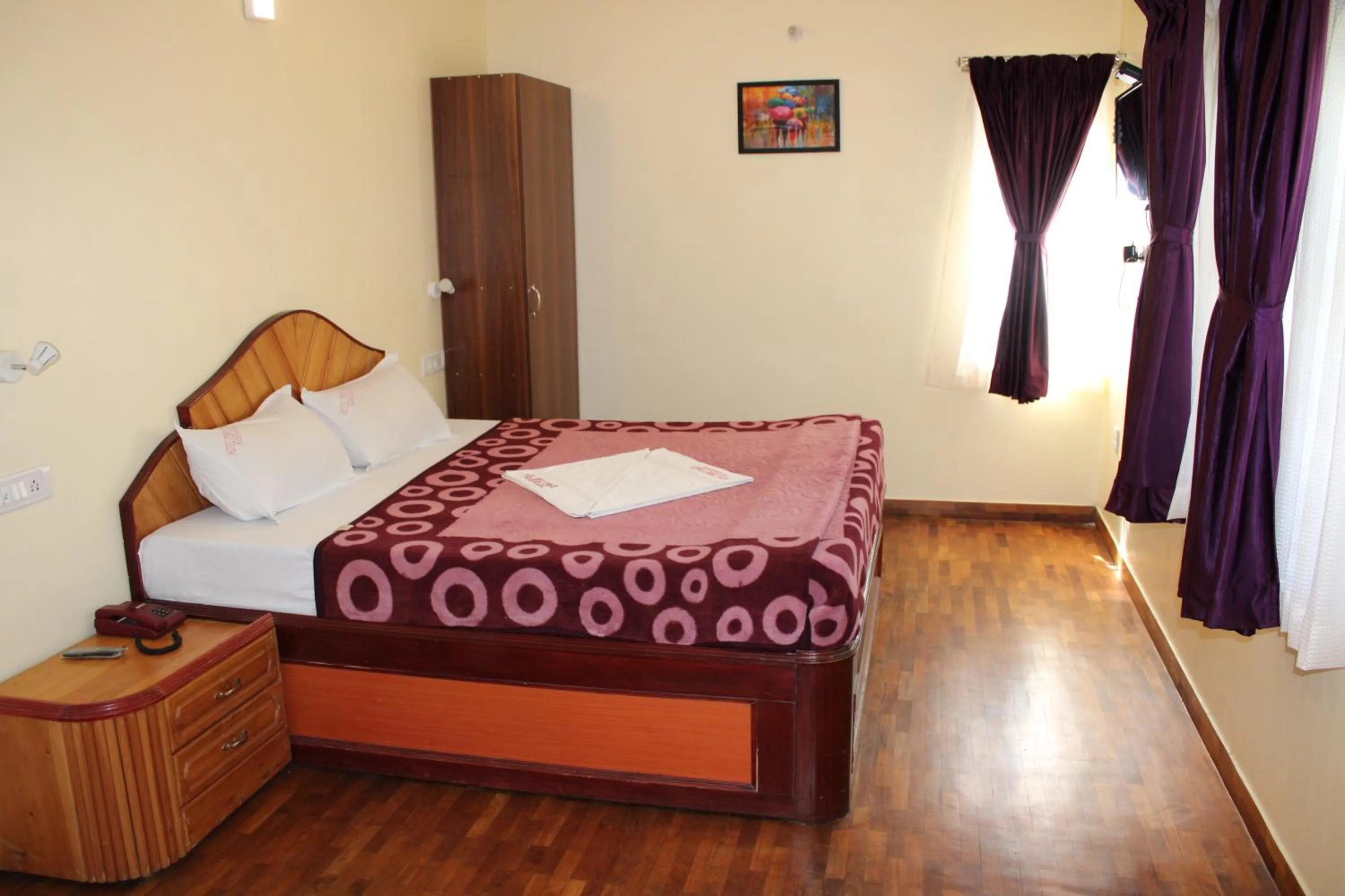 Bed in Hotel Temple Towers