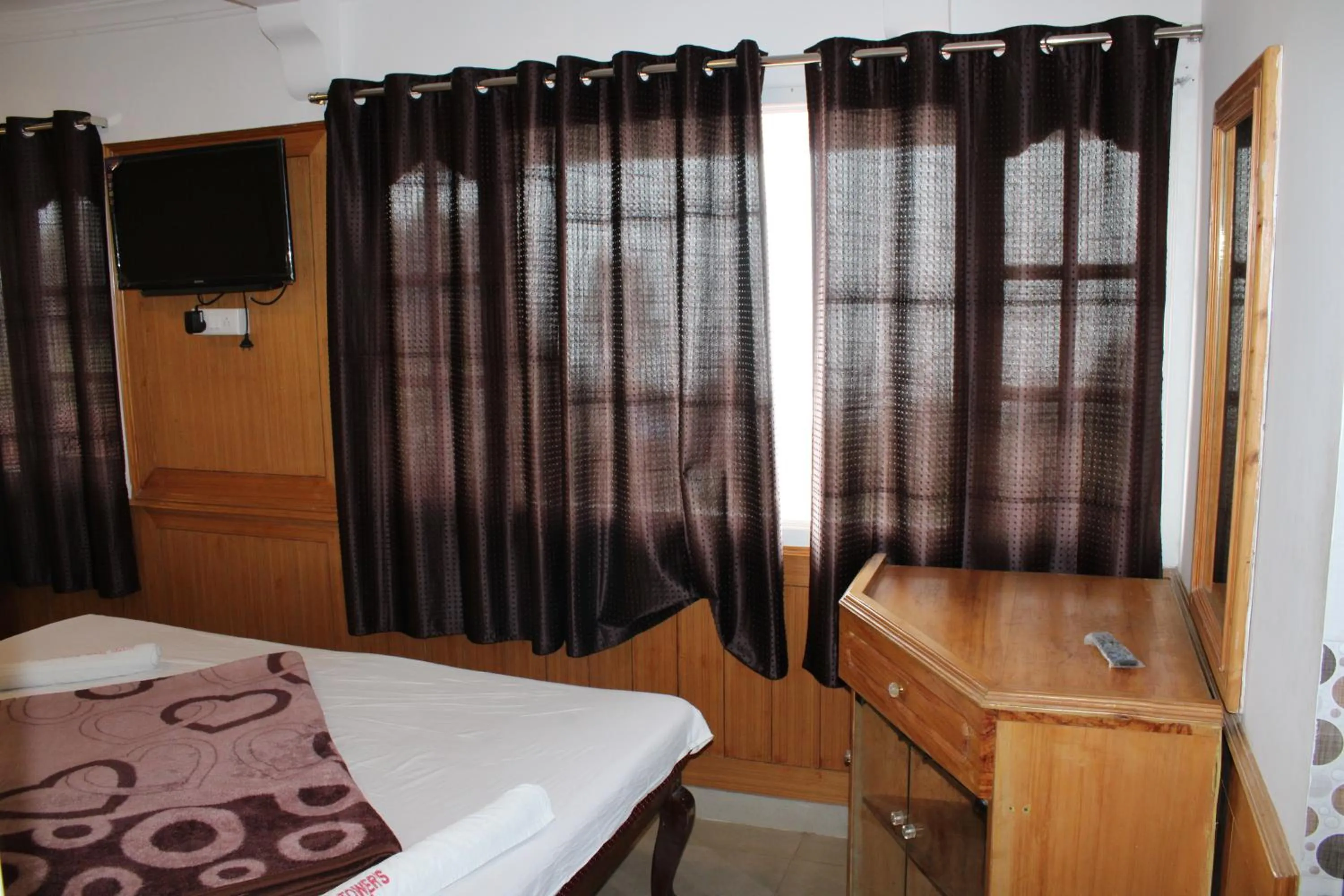 Bed in Hotel Temple Towers