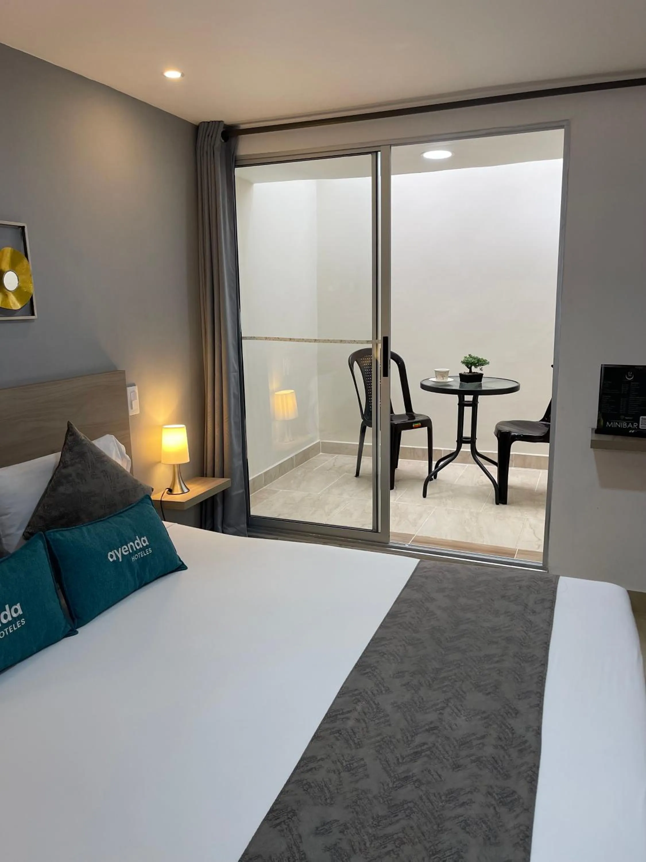 Patio, Bed in Hotel 12 Nights