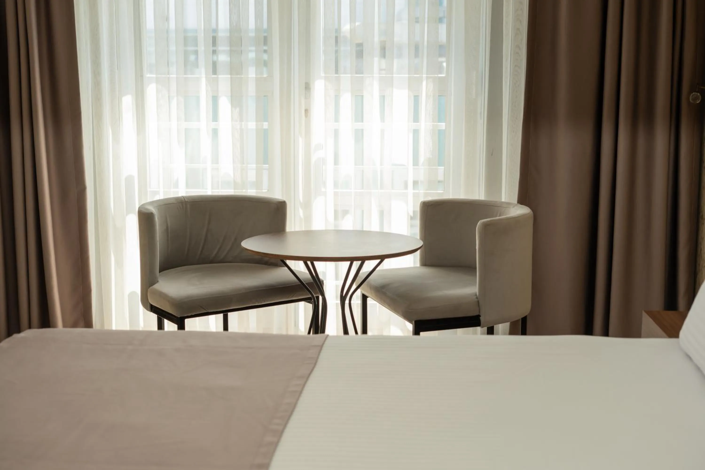 Bed in Velmore Hotel & Spa