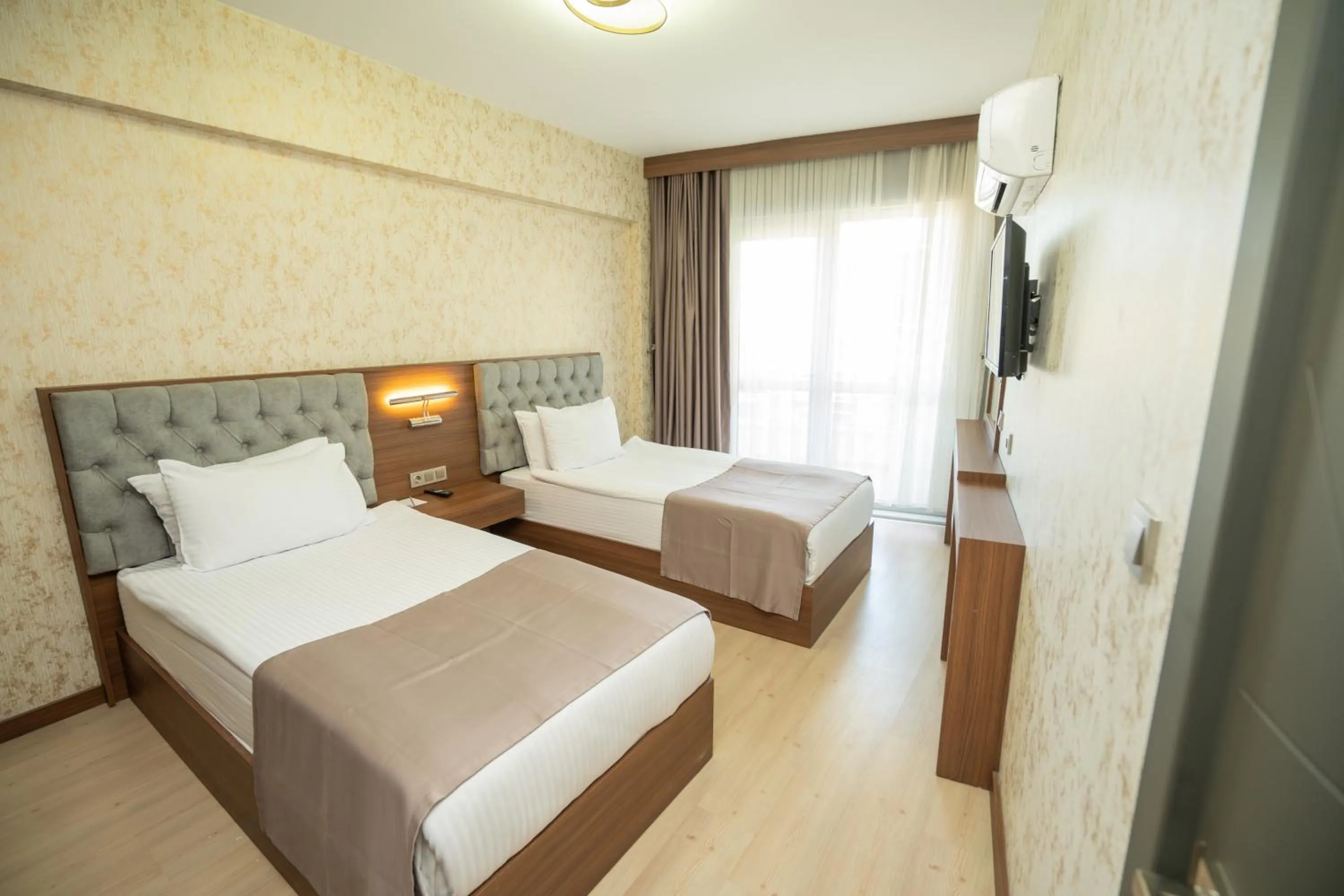 Bed in Velmore Hotel & Spa