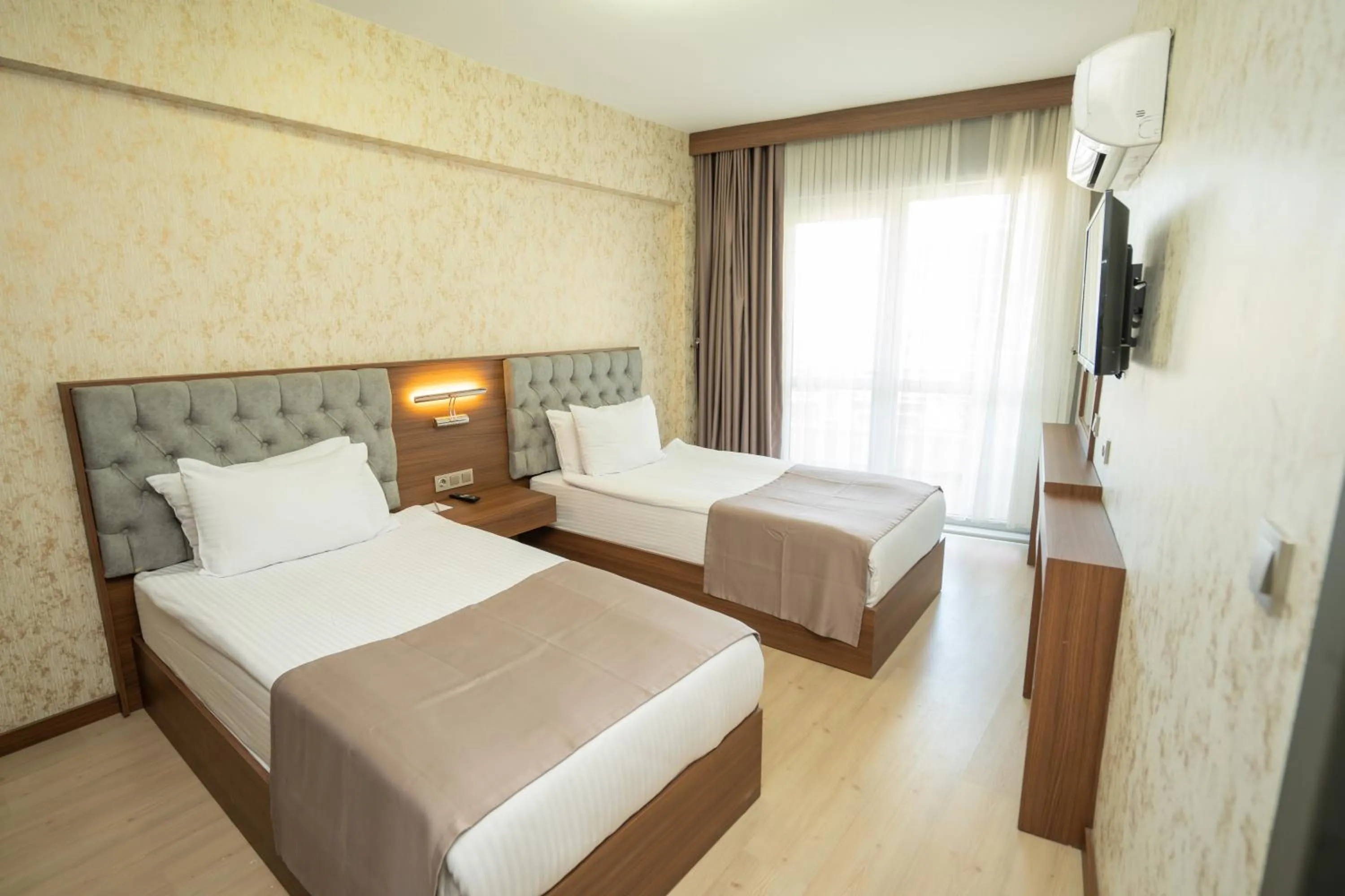 Bed in Velmore Hotel & Spa