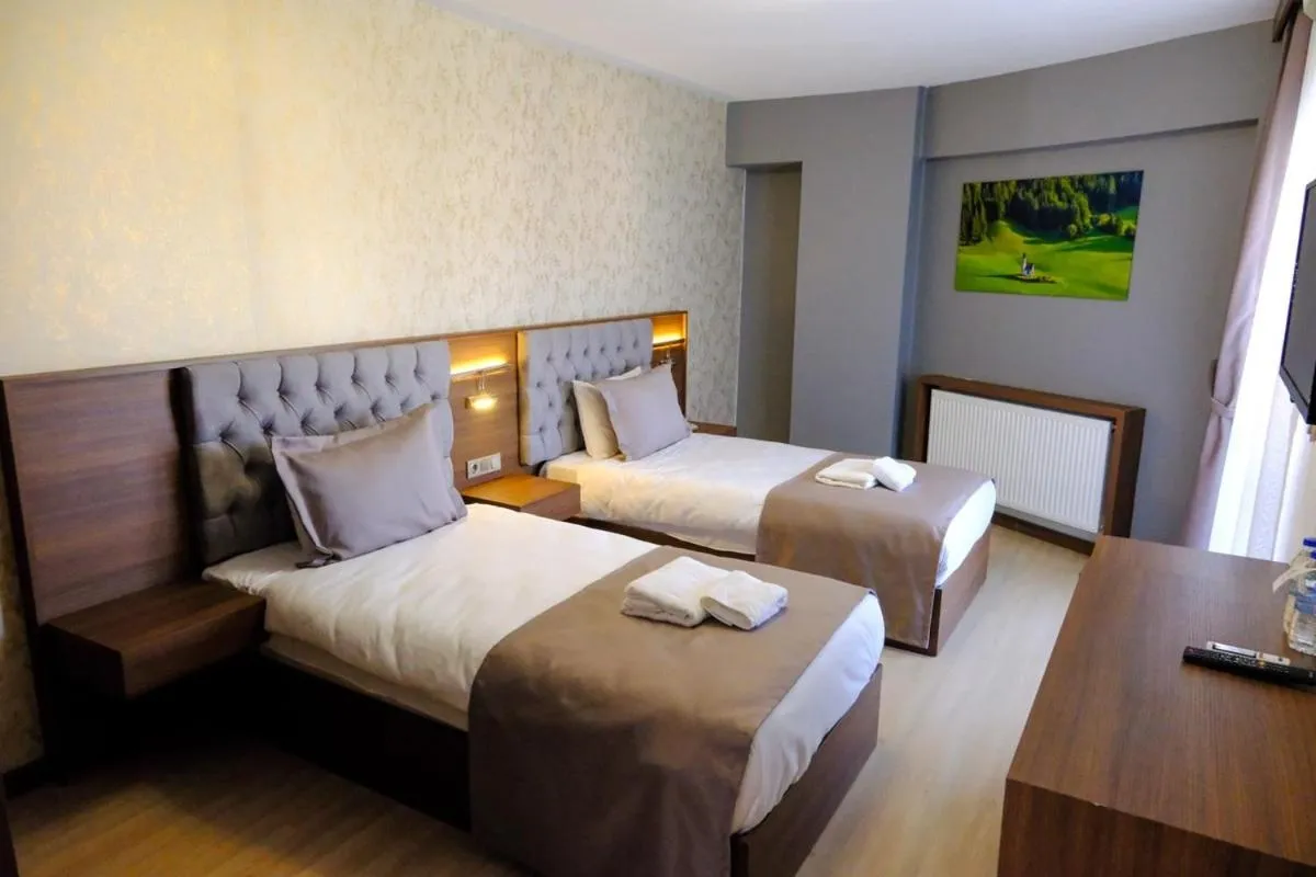 Bed in Velmore Hotel & Spa