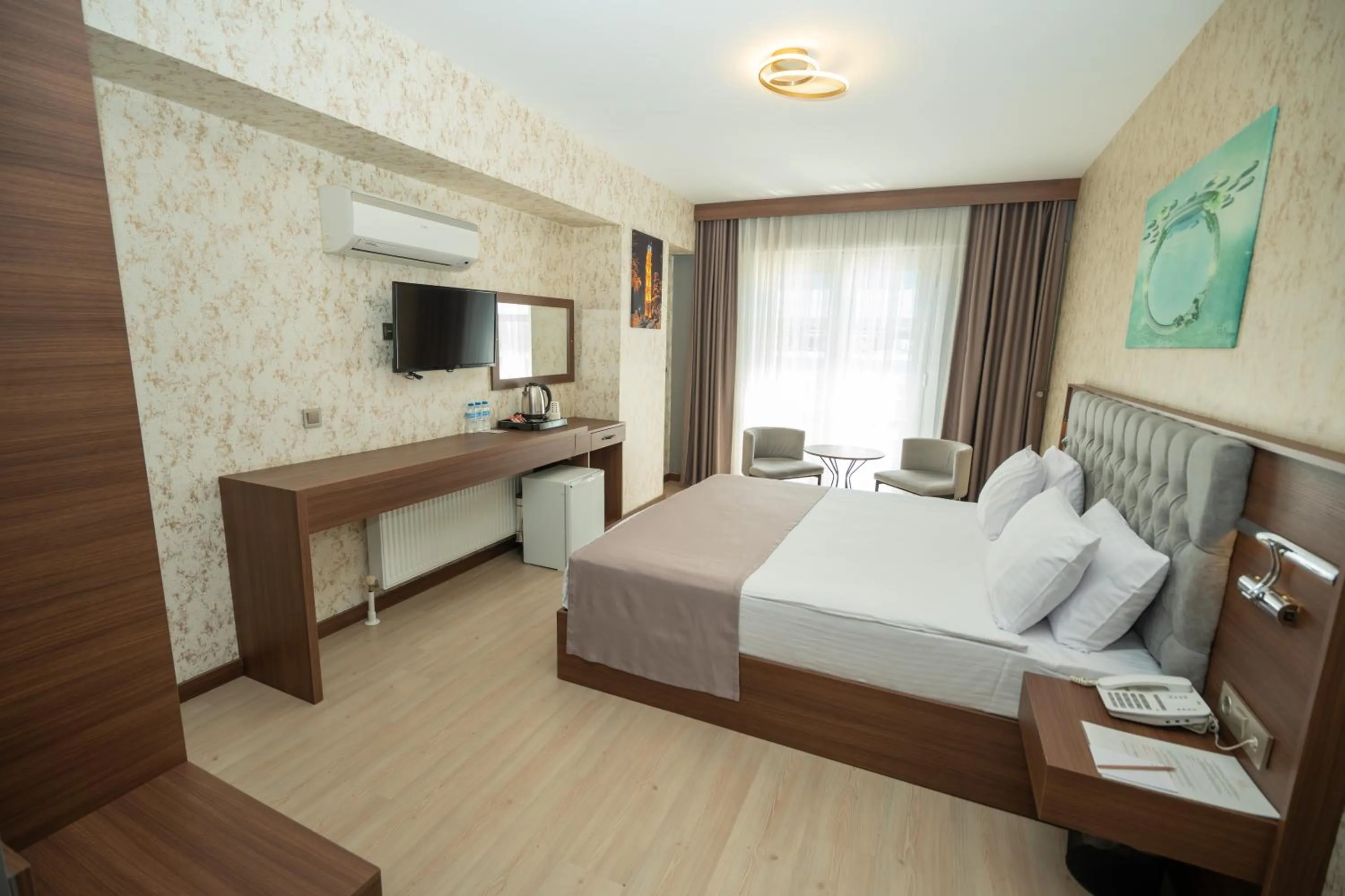 Bed in Velmore Hotel & Spa