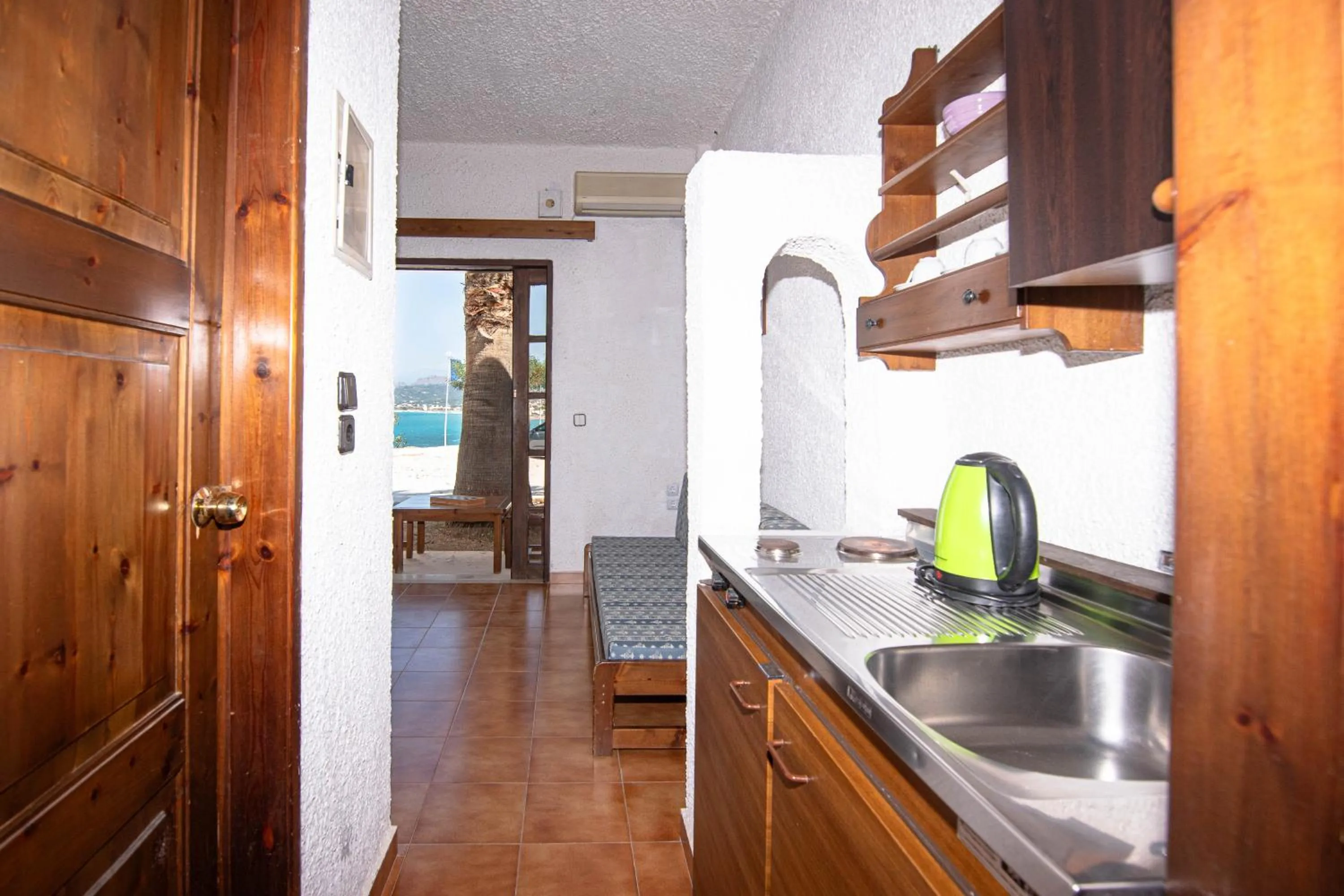 kitchen in Delfini Apartments
