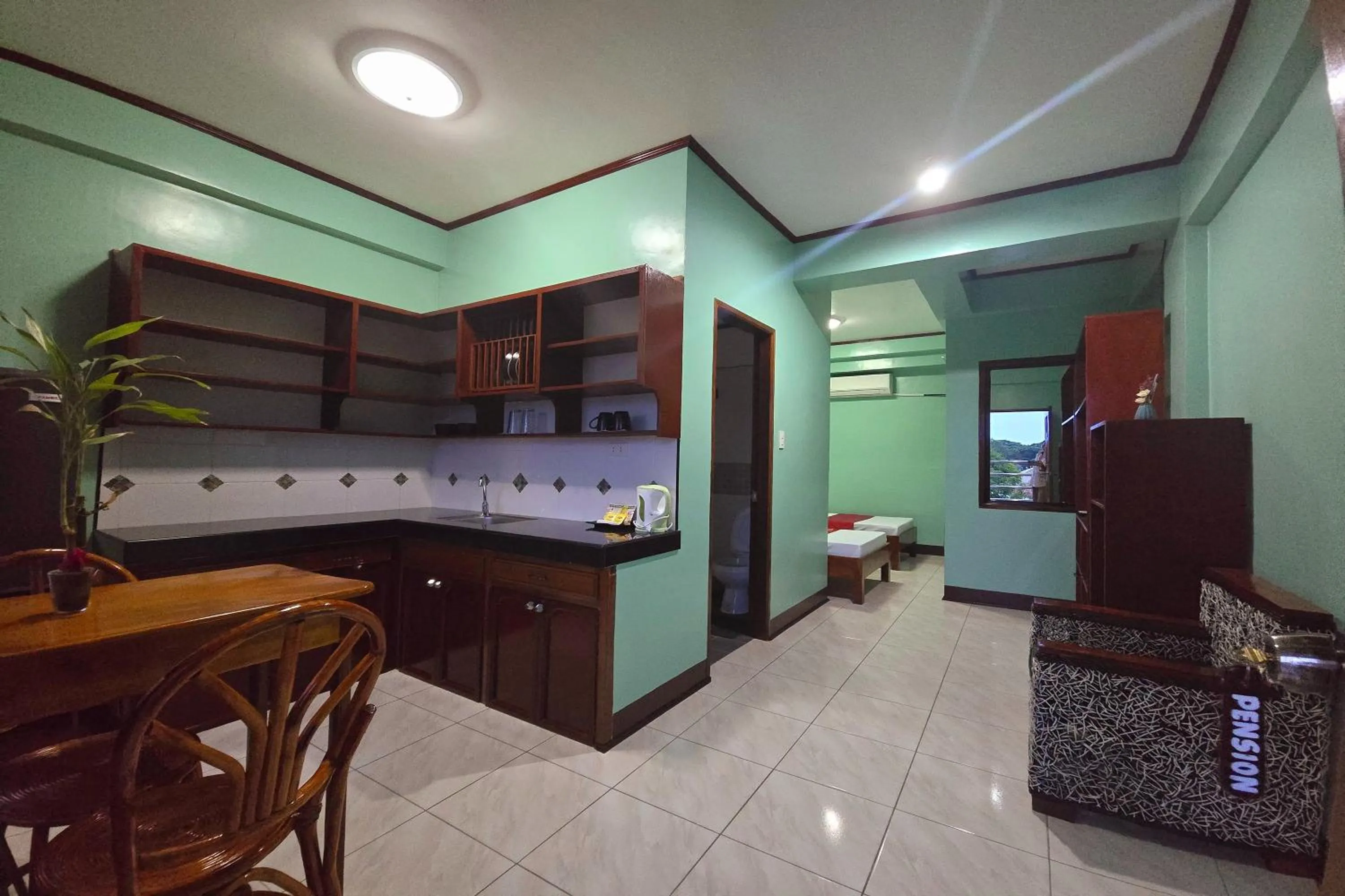 Kitchen or kitchenette in Nober Pension House City Center