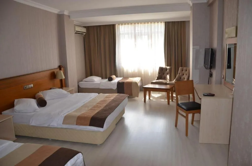 Bed in Green Mount Hotel