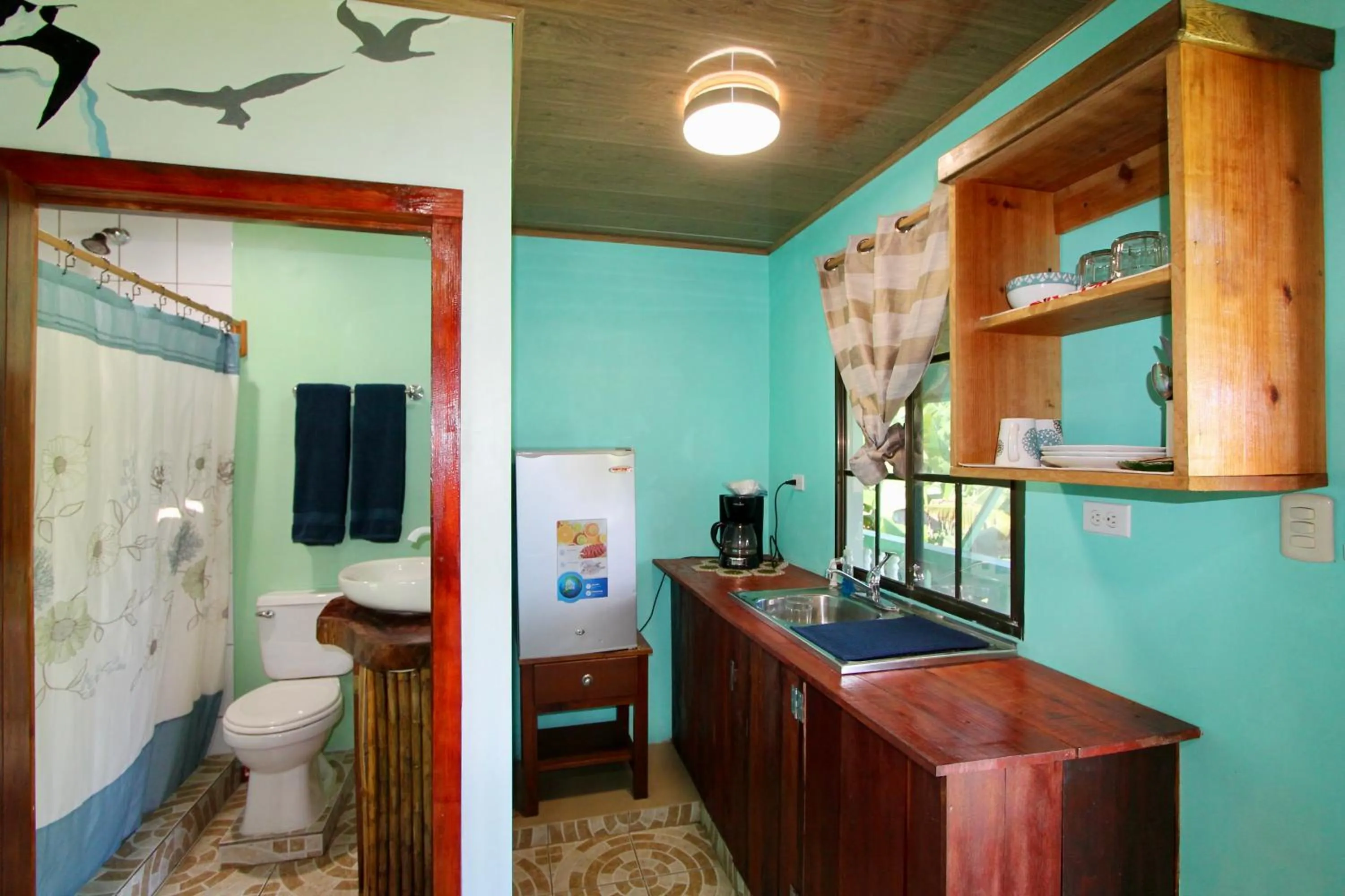 Kitchen or kitchenette in Hospedaje Rosa Del Mar & Sweets Cafe