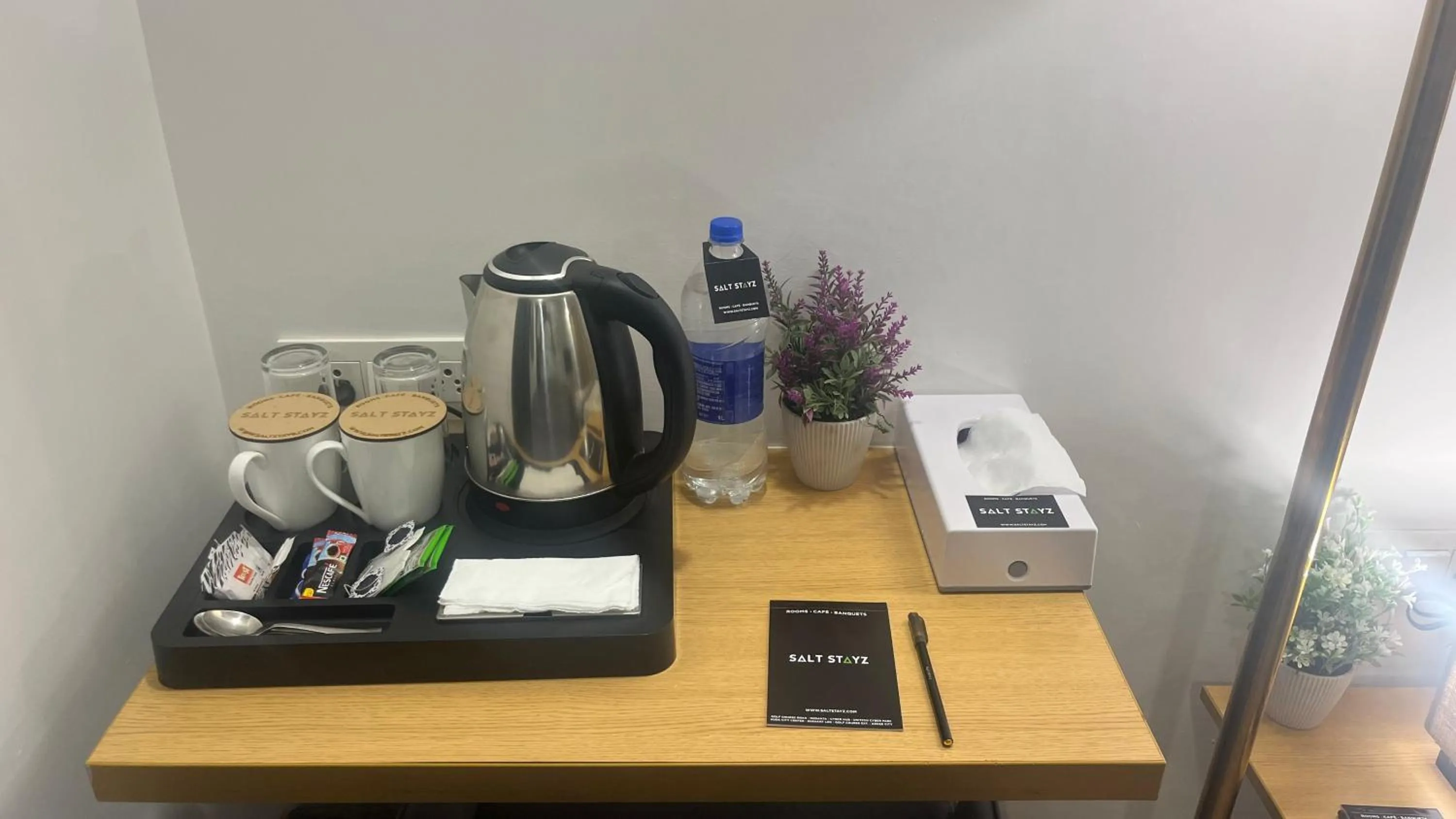 Kitchen or kitchenette in Saltstayz Express - Golf Course Road & DLF Phase-1