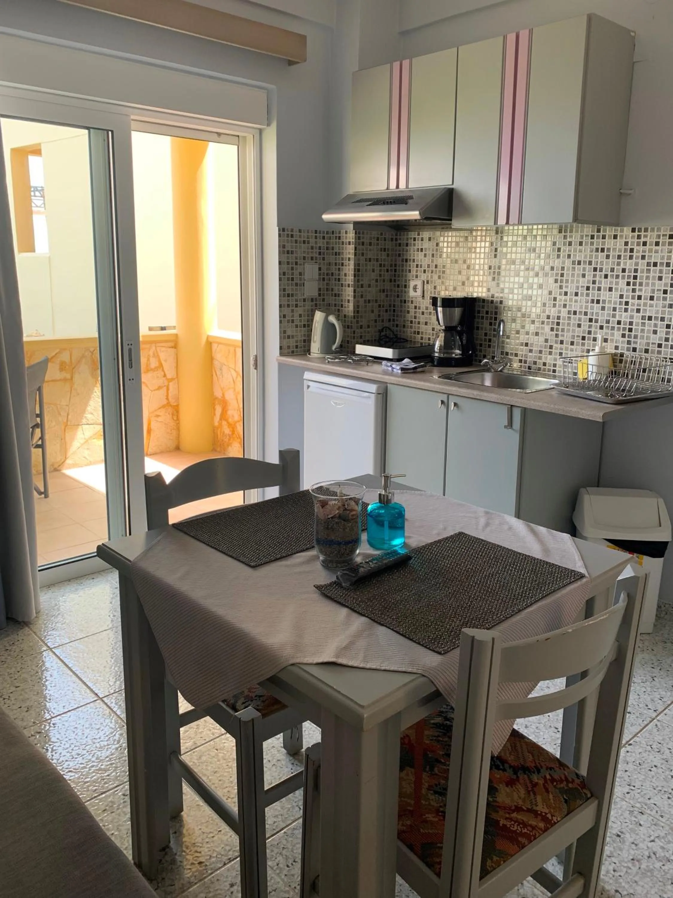 Kitchen or kitchenette in Ermis Suites