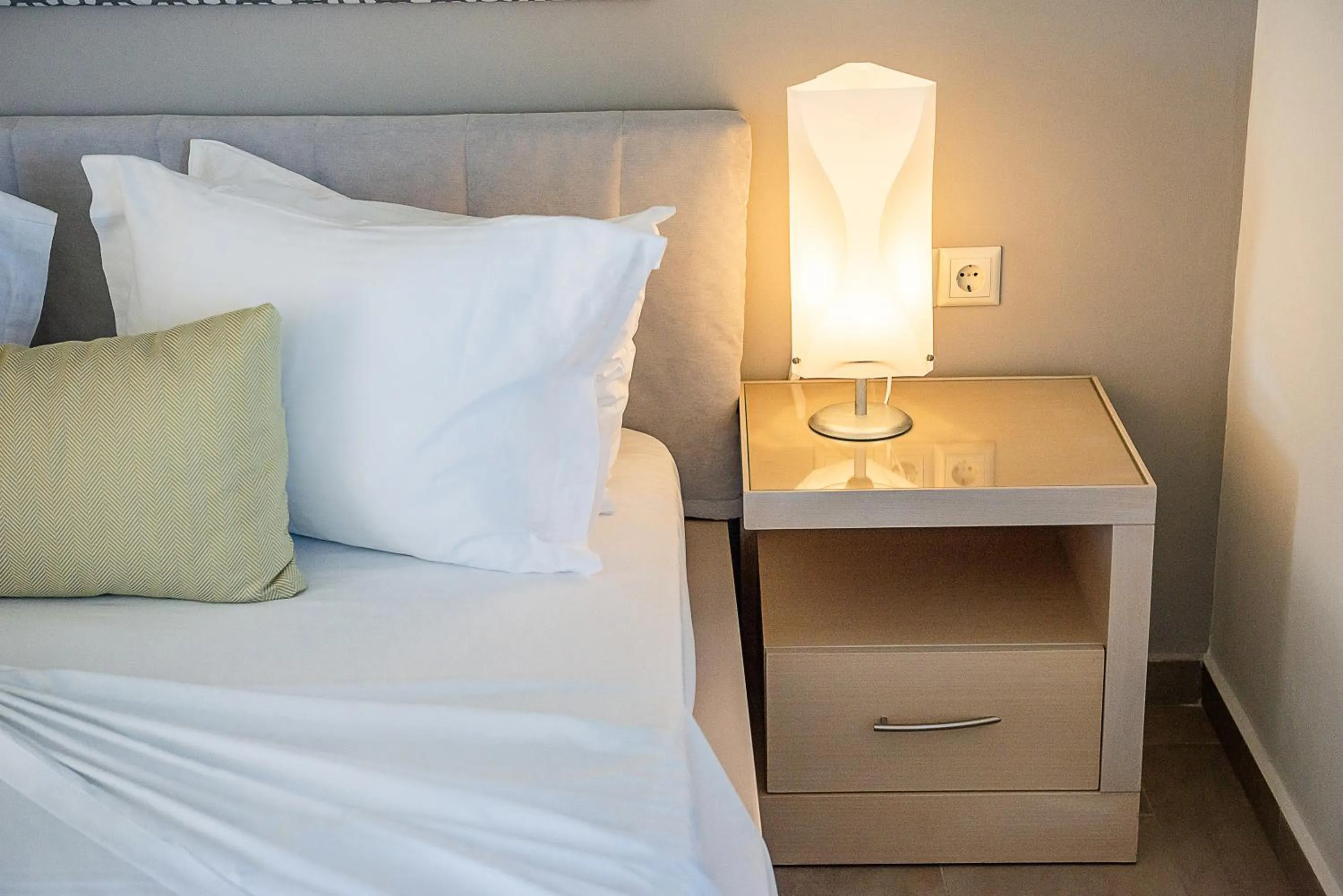 Bed in Kavos Hotel & Suites