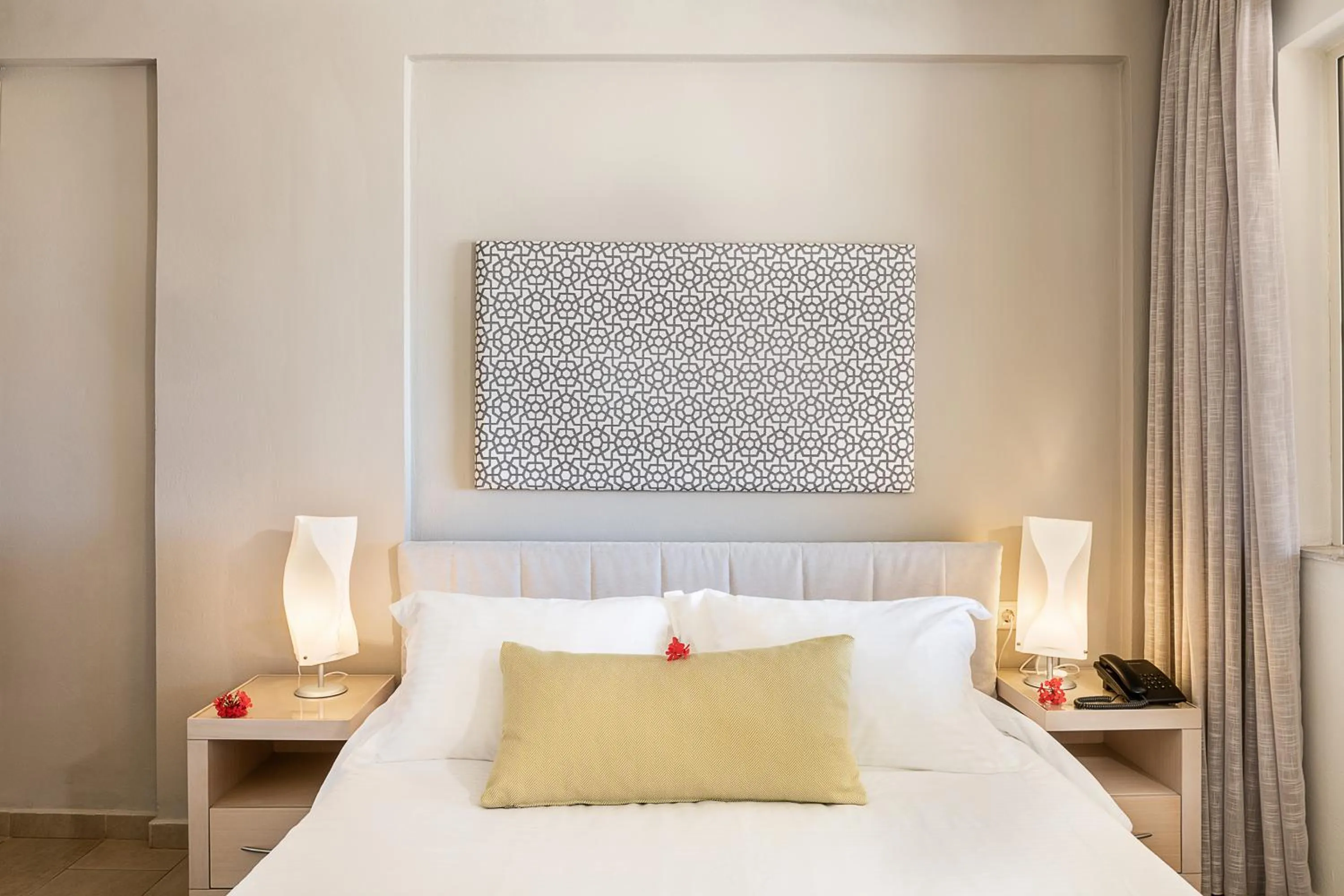 Bed in Kavos Hotel & Suites